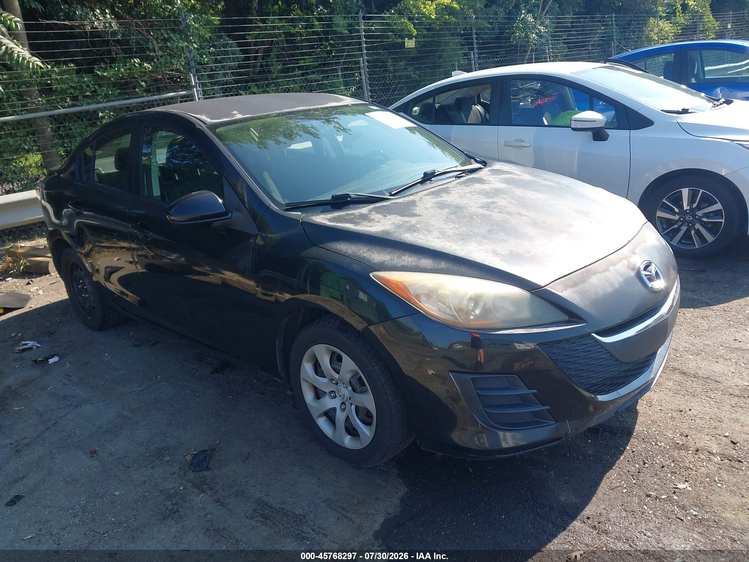 2010 Mazda 3 i Touring, VIN JM1BL1SF9A1180808 — Normal wear