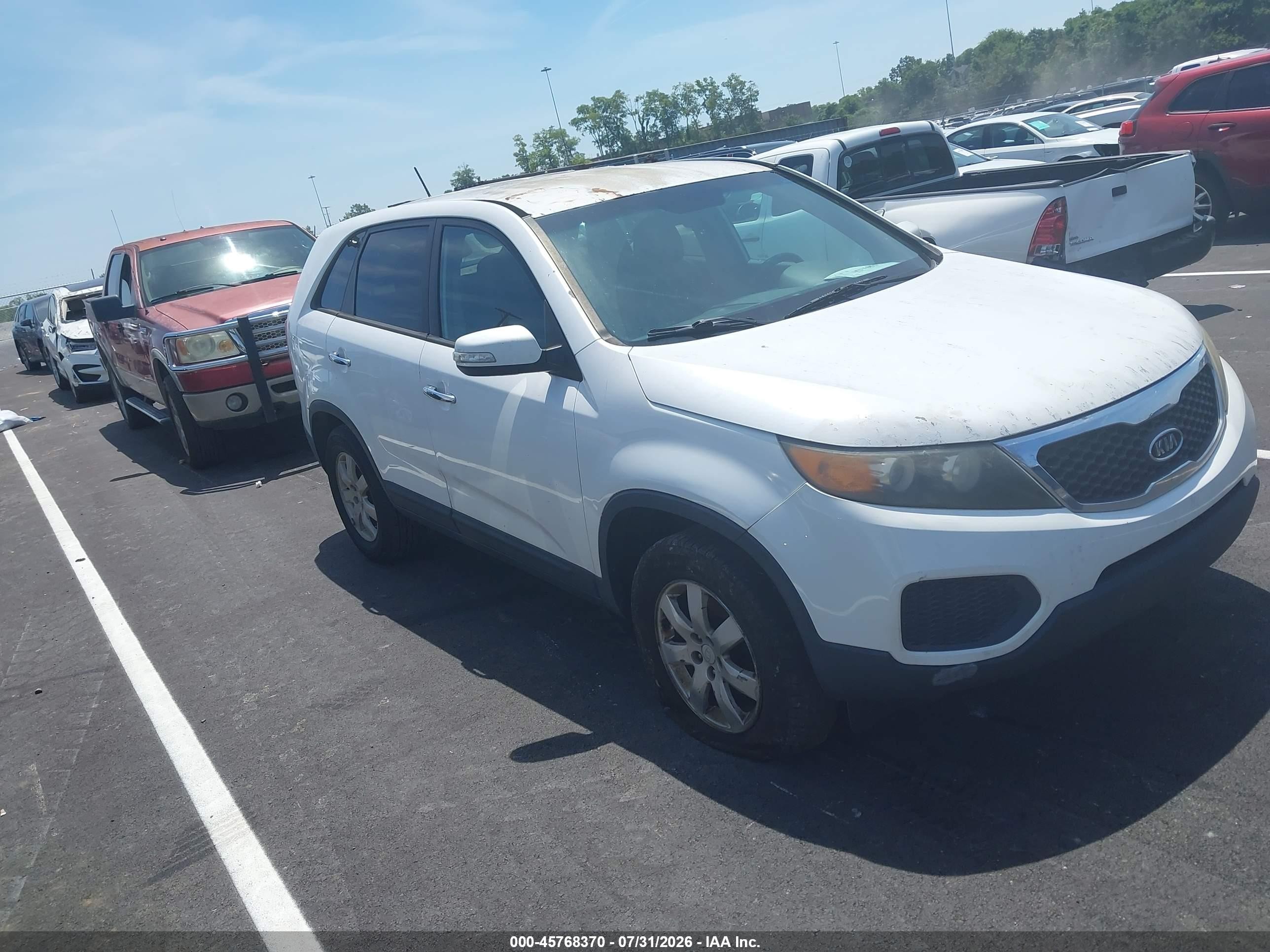 2011 Kia Sorento, VIN 5XYKT3A17BG177621 — Normal wear