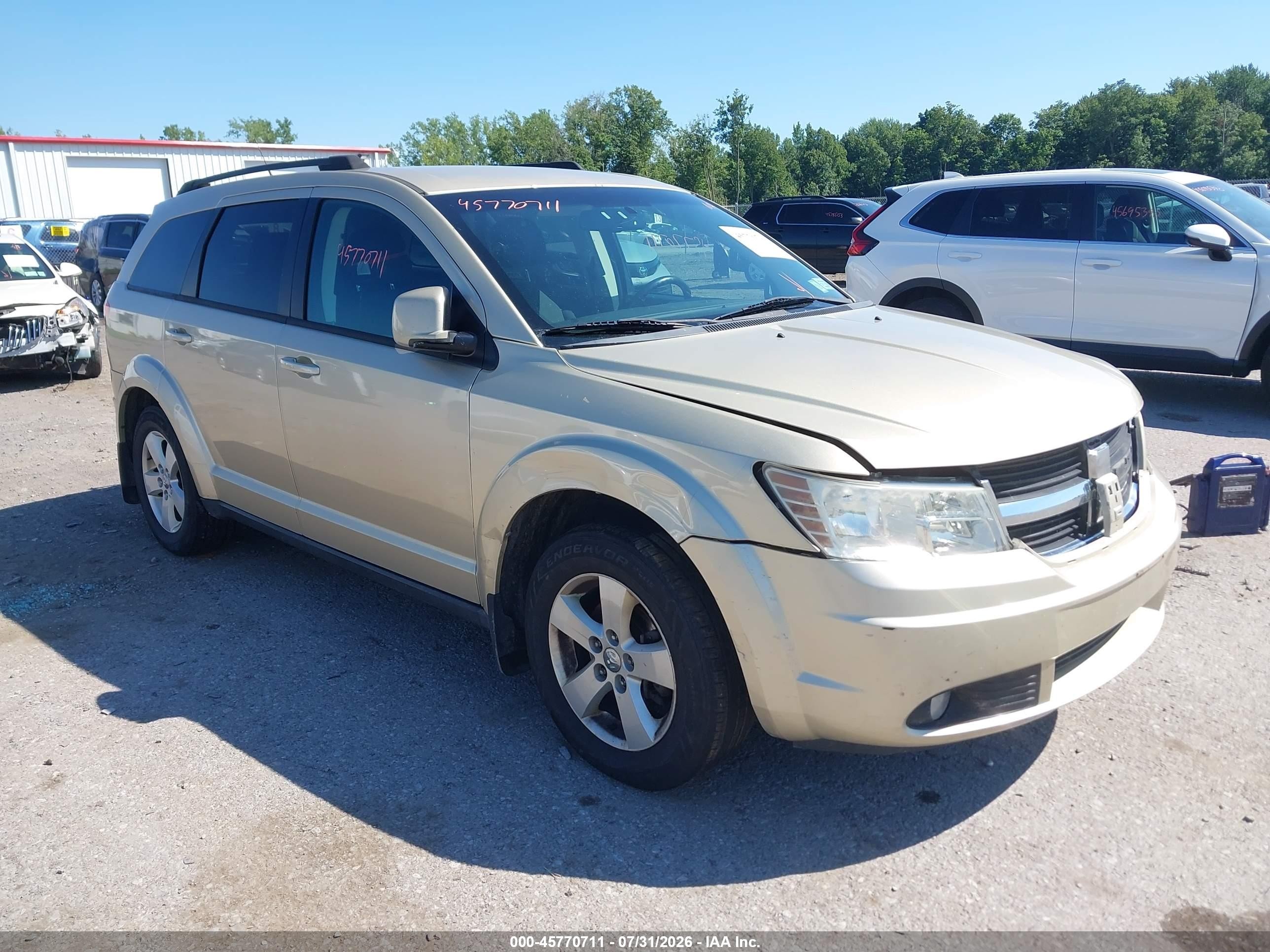 2010 Dodge Journey SXT, VIN 3D4PG5FV2AT145283 — Front end