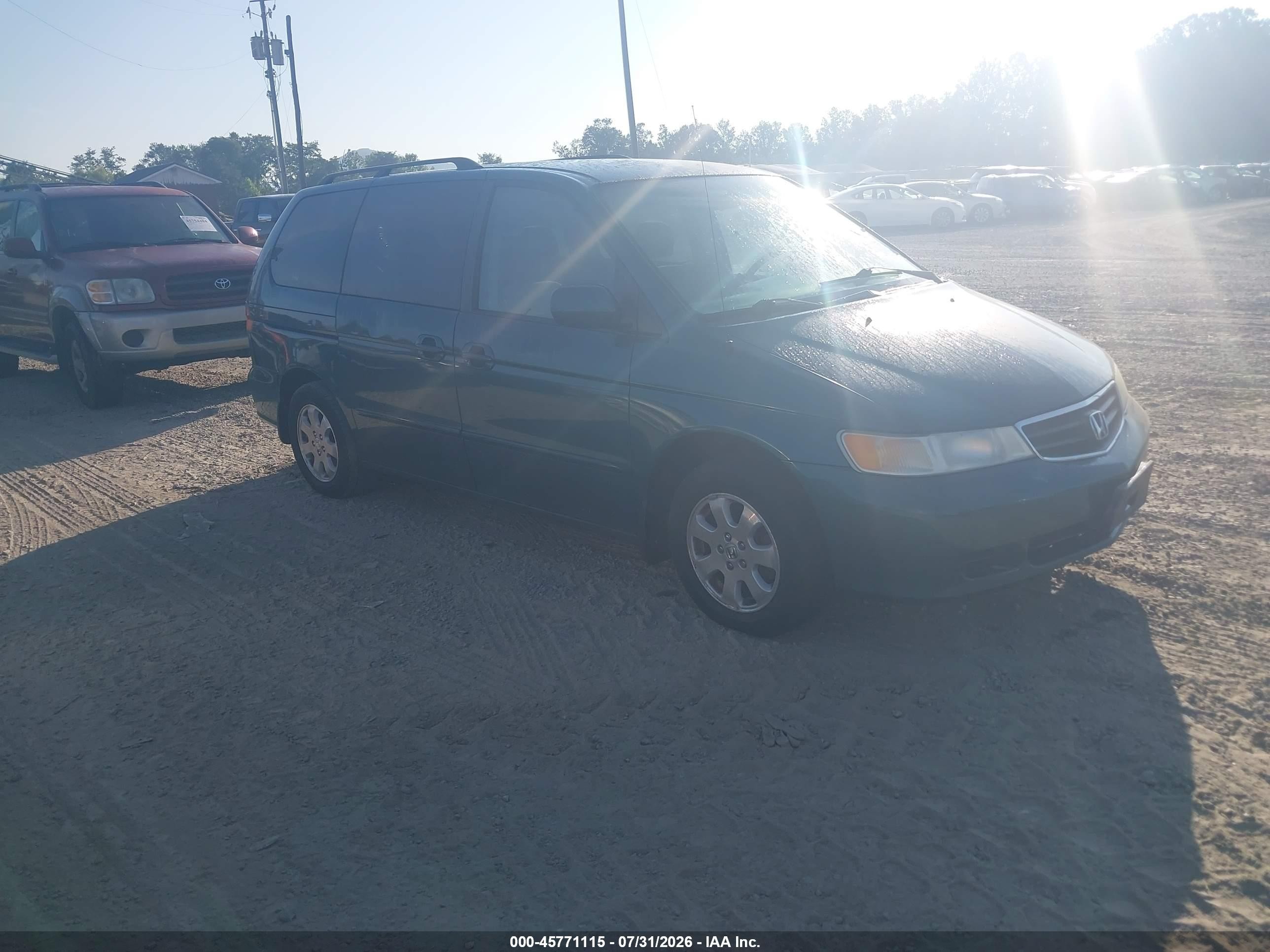 2002 Honda Odyssey EX, VIN 2HKRL18602H558126 — Обычный износ