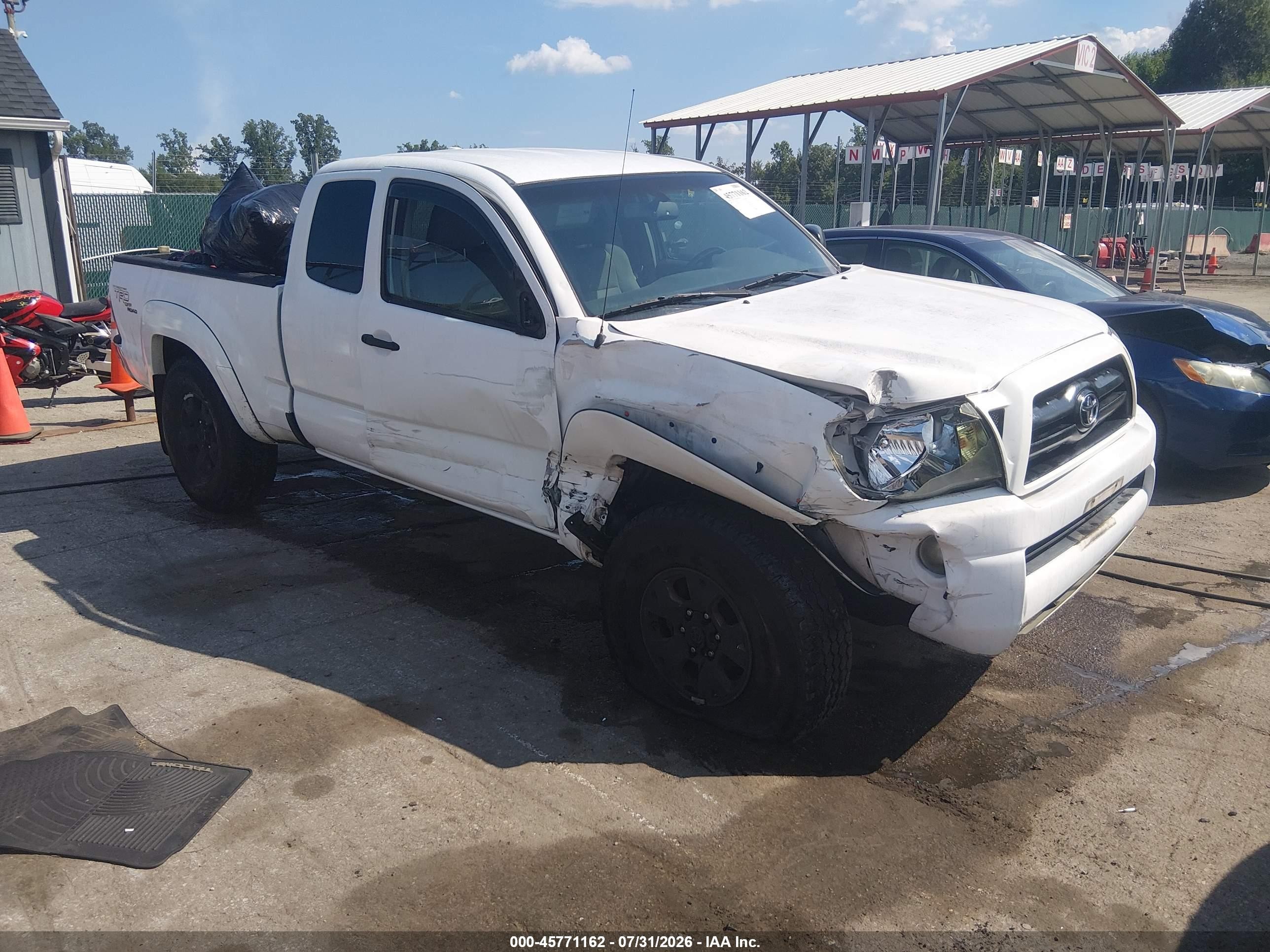 2009 Toyota Tacoma, VIN 5TEUU42N09Z649672 — Side