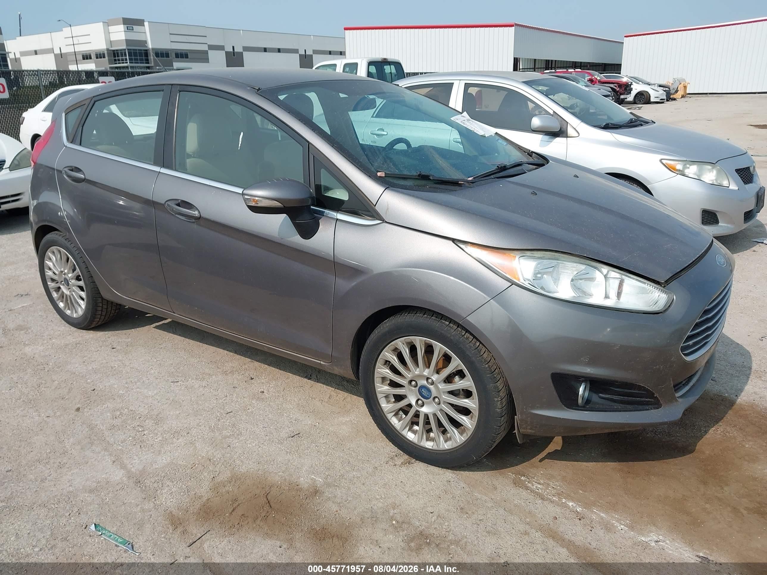 2014 Ford Fiesta Titanium, VIN 3FADP4FJ3EM176961 — Normal wear