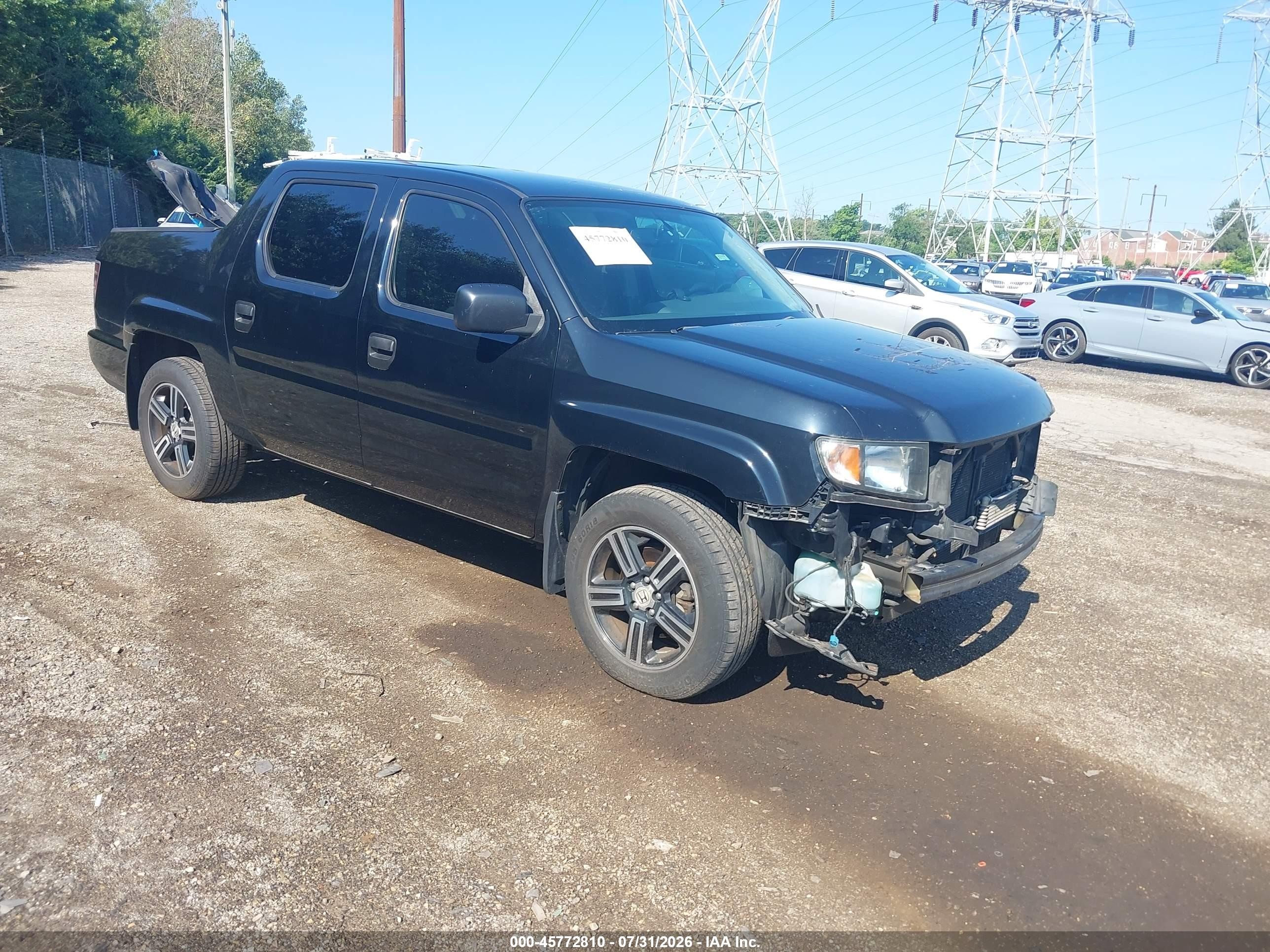 2013 Honda Ridgeline Sport, VIN 5FPYK1F76DB008349 — Side