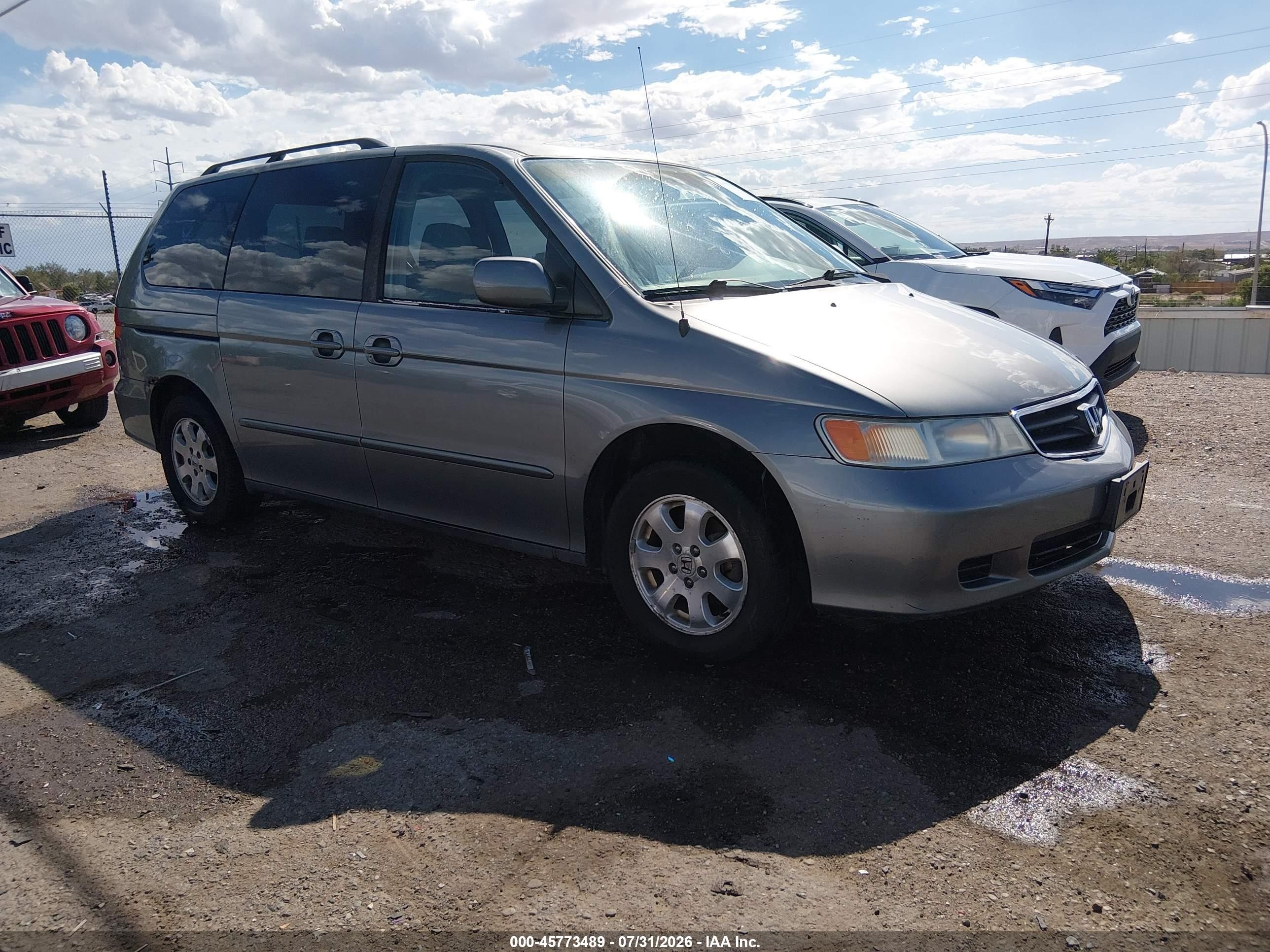 2002 Honda Odyssey EX, VIN 2HKRL18672H506119 — Обычный износ