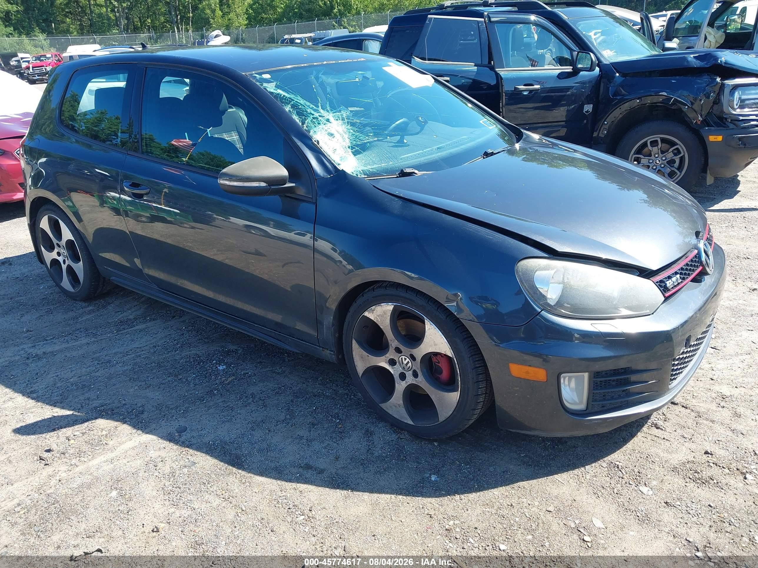 2012 Volkswagen Golf GTI PZEV, VIN WVWED7AJ9CW137739 — Side