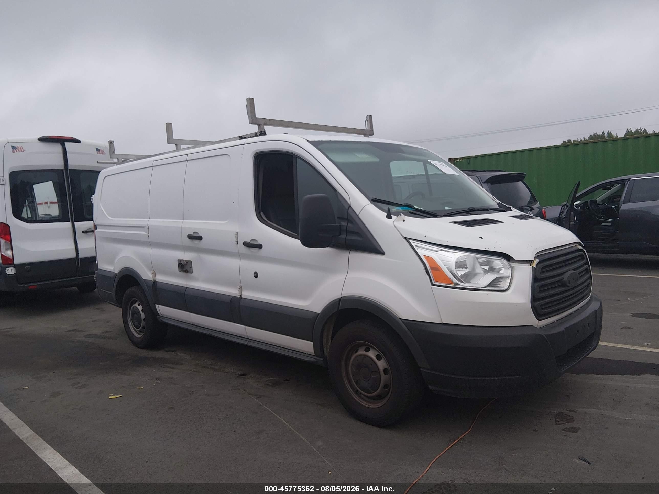 2015 Ford Transit Cargo, VIN 1FTNE1ZM6FKA63989 — Зад
