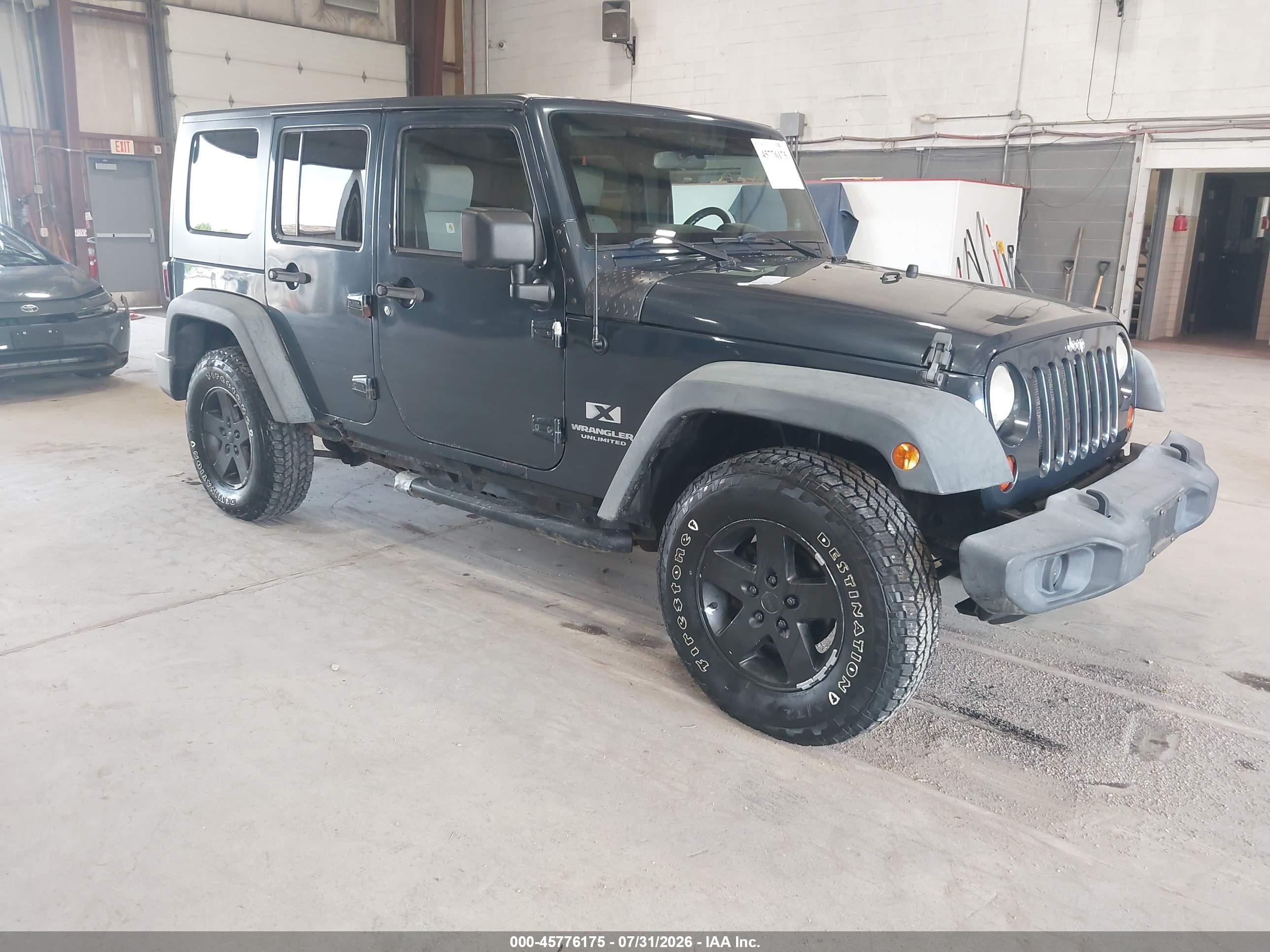 2008 Jeep Wrangler Unlimited X, VIN 1J4GA39168L519793 — Normal wear