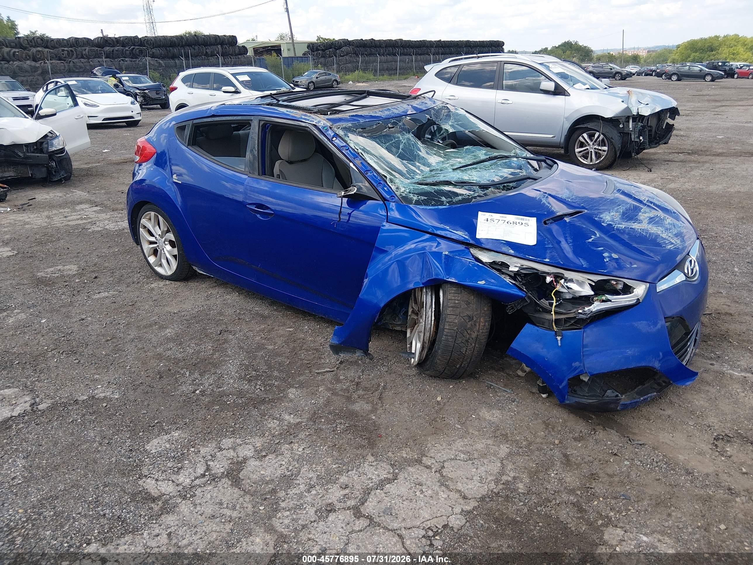 2012 Hyundai Veloster w/Gray Int, VIN KMHTC6AD9CU059839 — Rollover