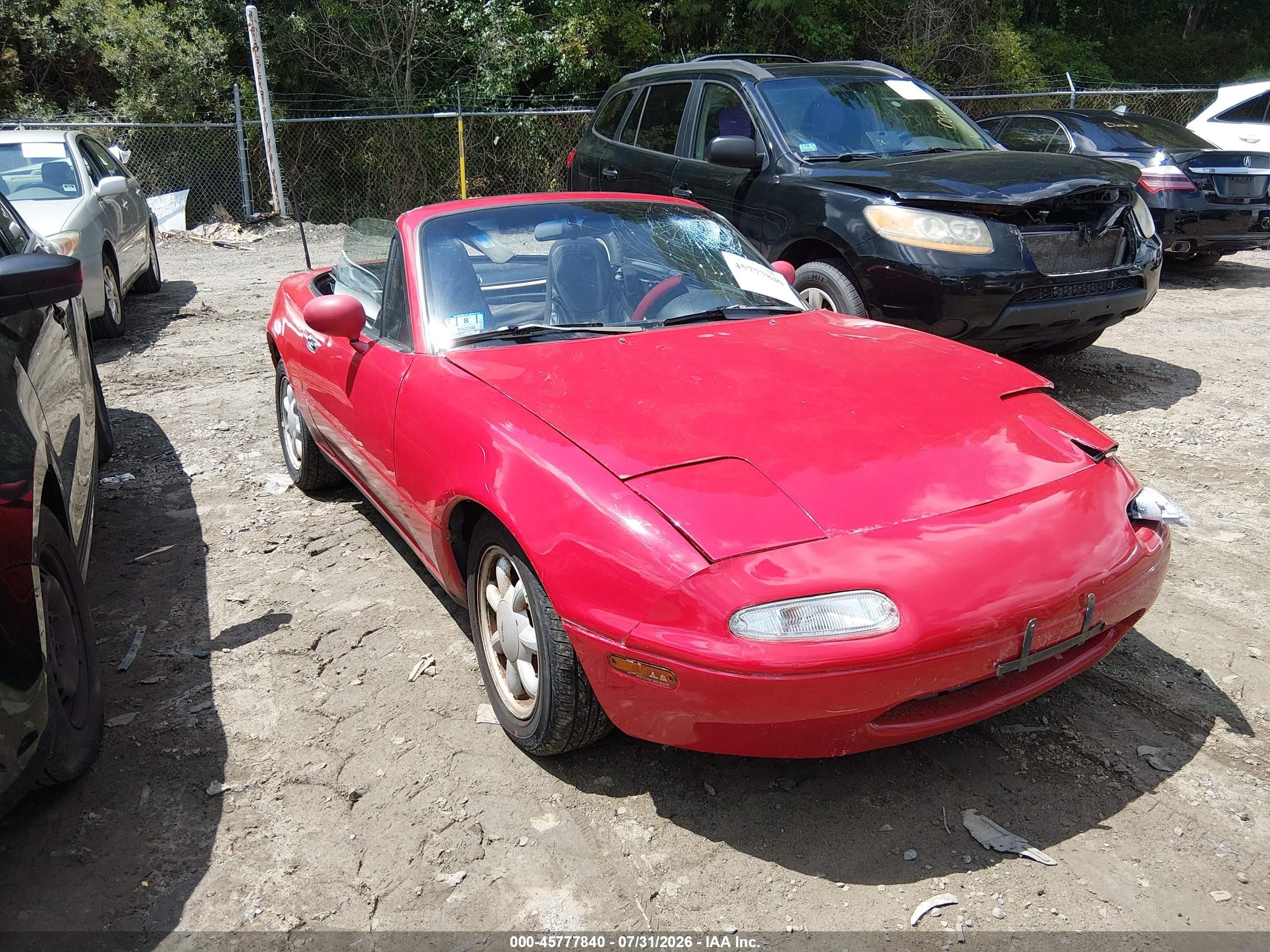 1990 Mazda MX-5 Miata, VIN JM1NA3510L0156257 — Бок