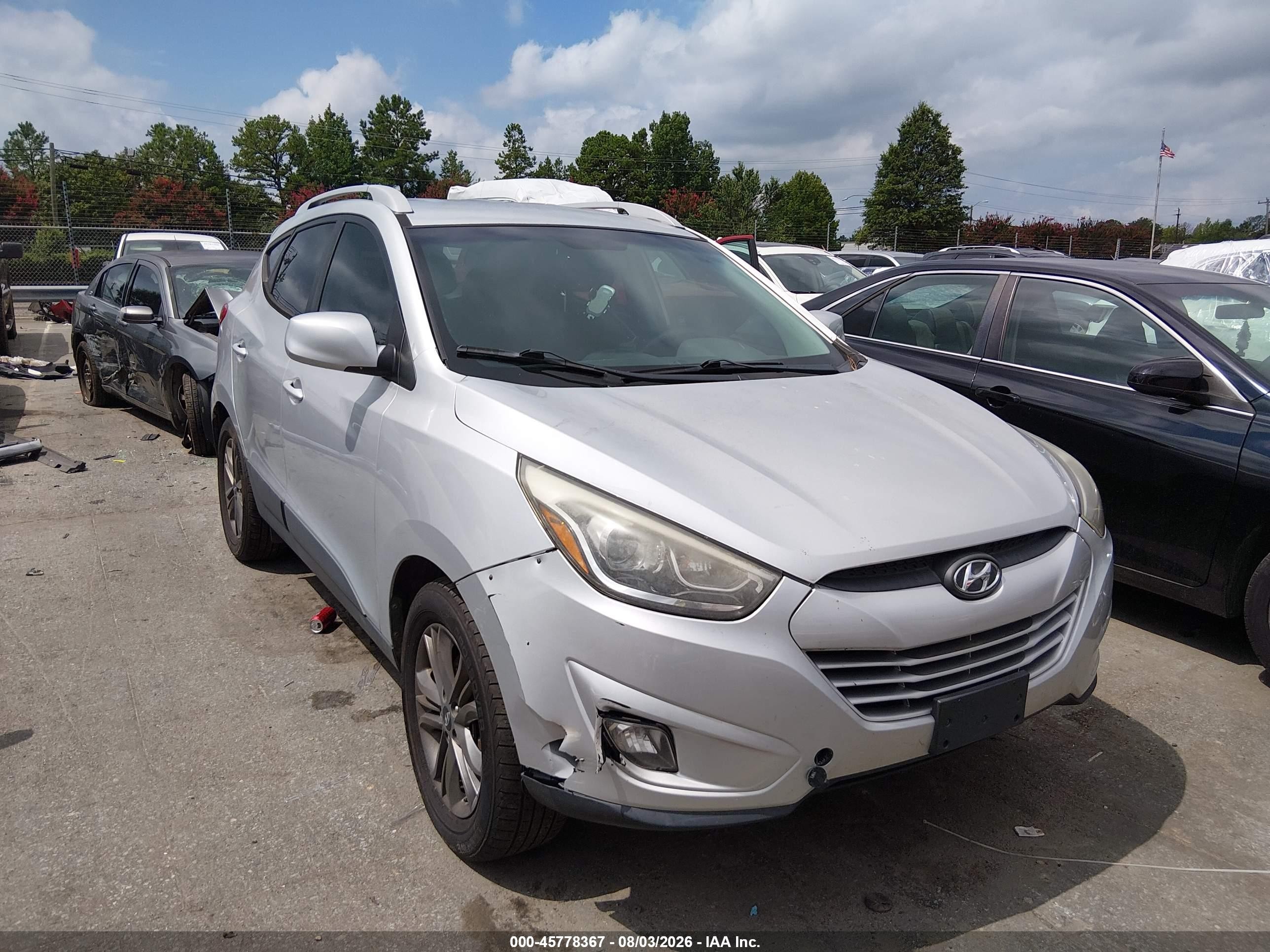 2014 Hyundai Tucson SE, VIN KM8JU3AGXEU897698 — Rear end