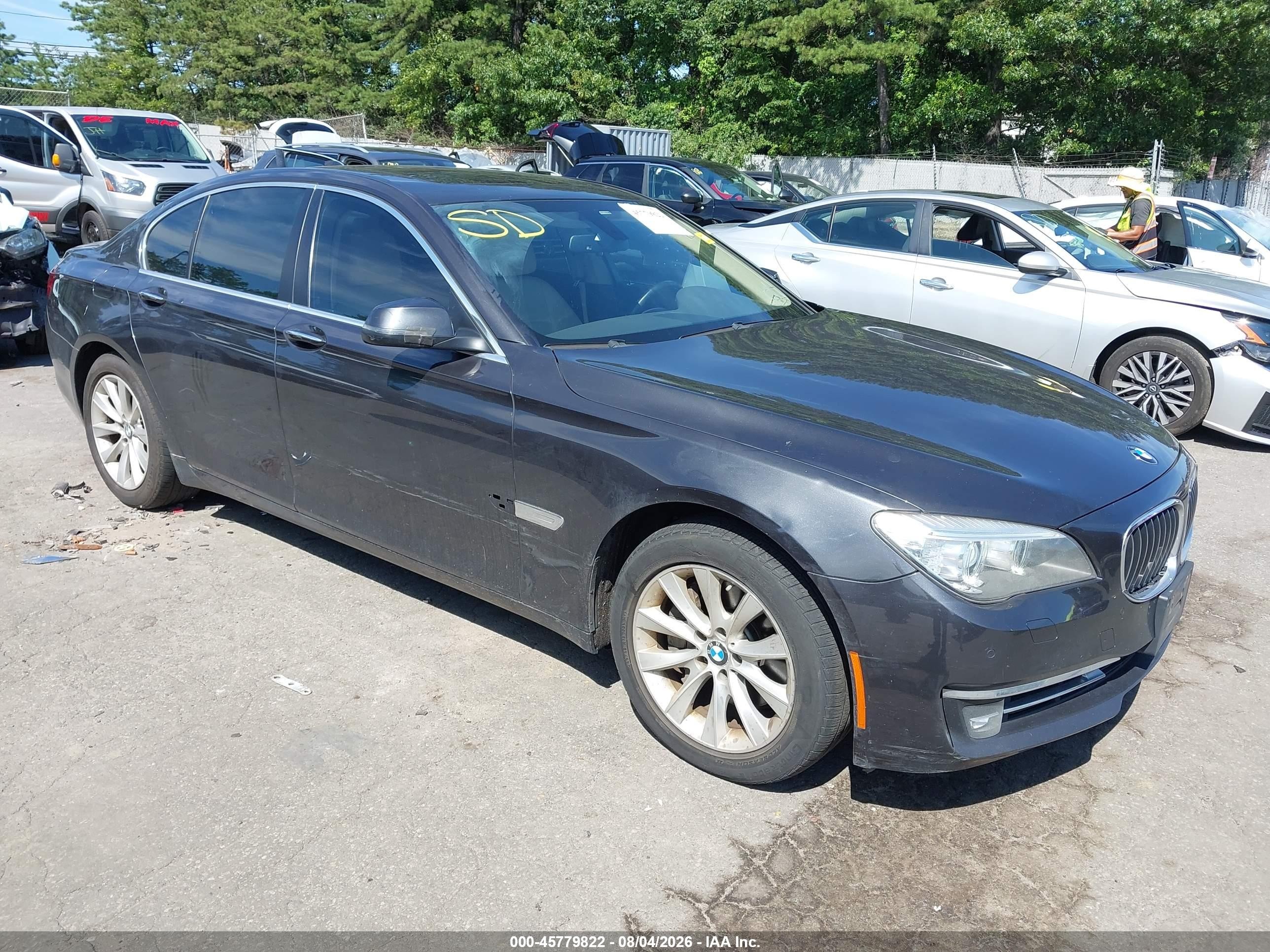 2015 BMW 7 Series 740i, VIN WBAYA6C55FGK16479 — Side
