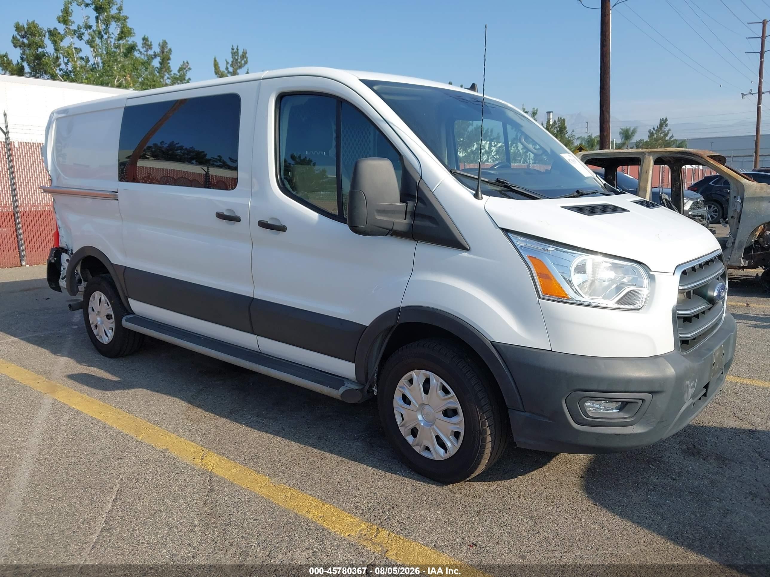 2020 Ford Transit Cargo, VIN 1FTBR1Y86LKB13930 — Бок