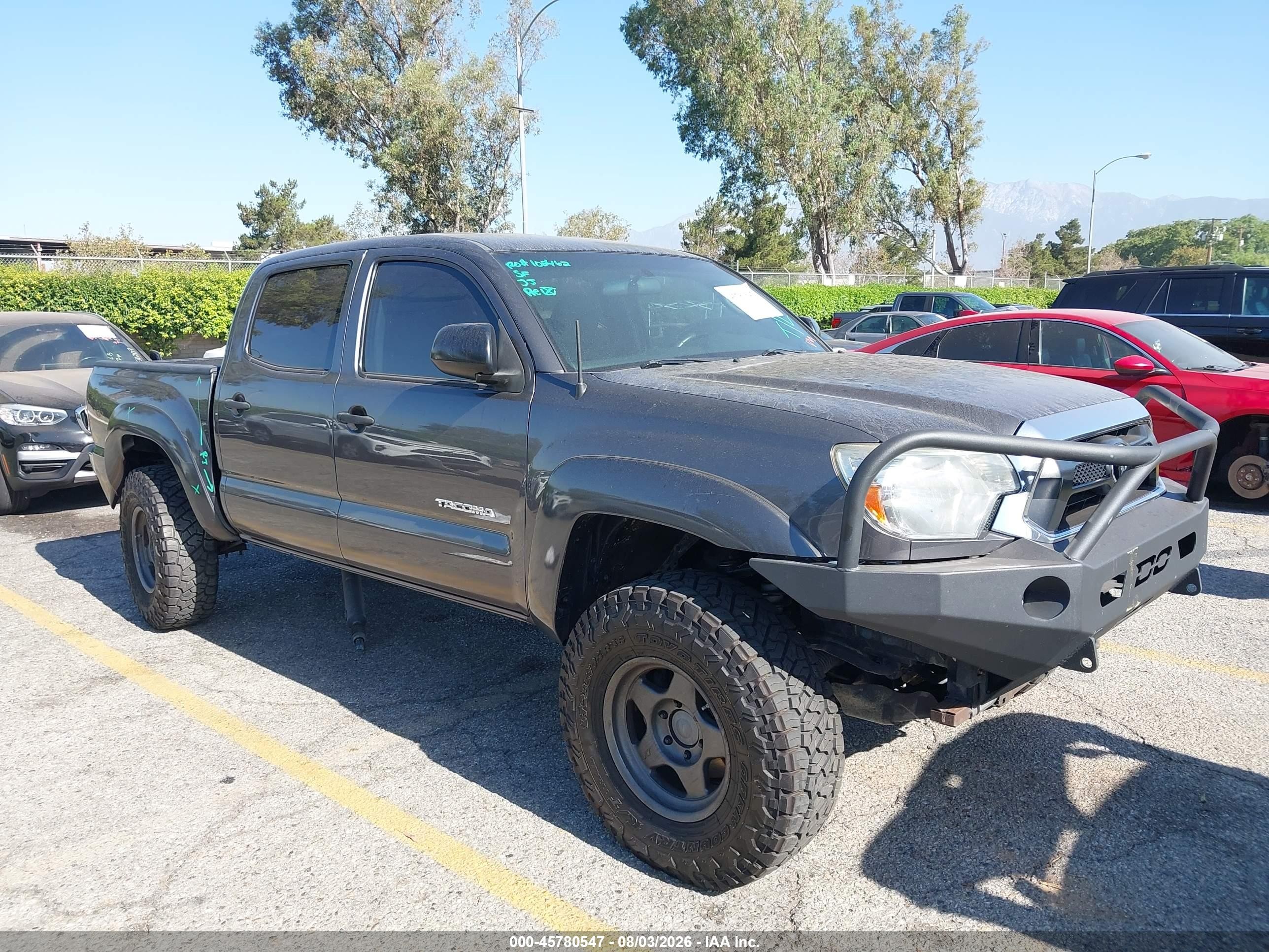 2015 Toyota Tacoma, VIN 5TFLU4ENXFX140425 — Side