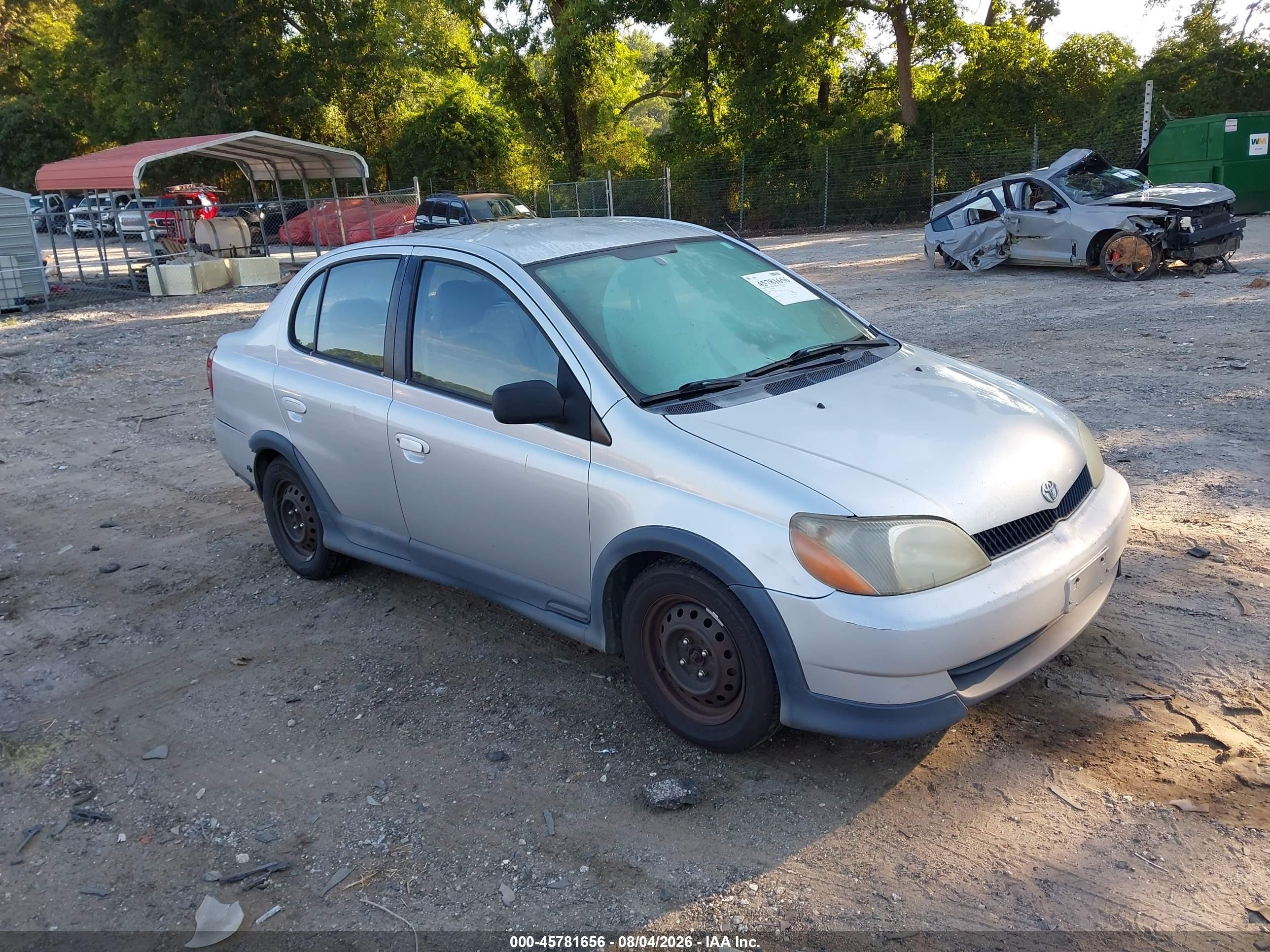 2002 Toyota ECHO, VIN JTDBT123225025517 — Side