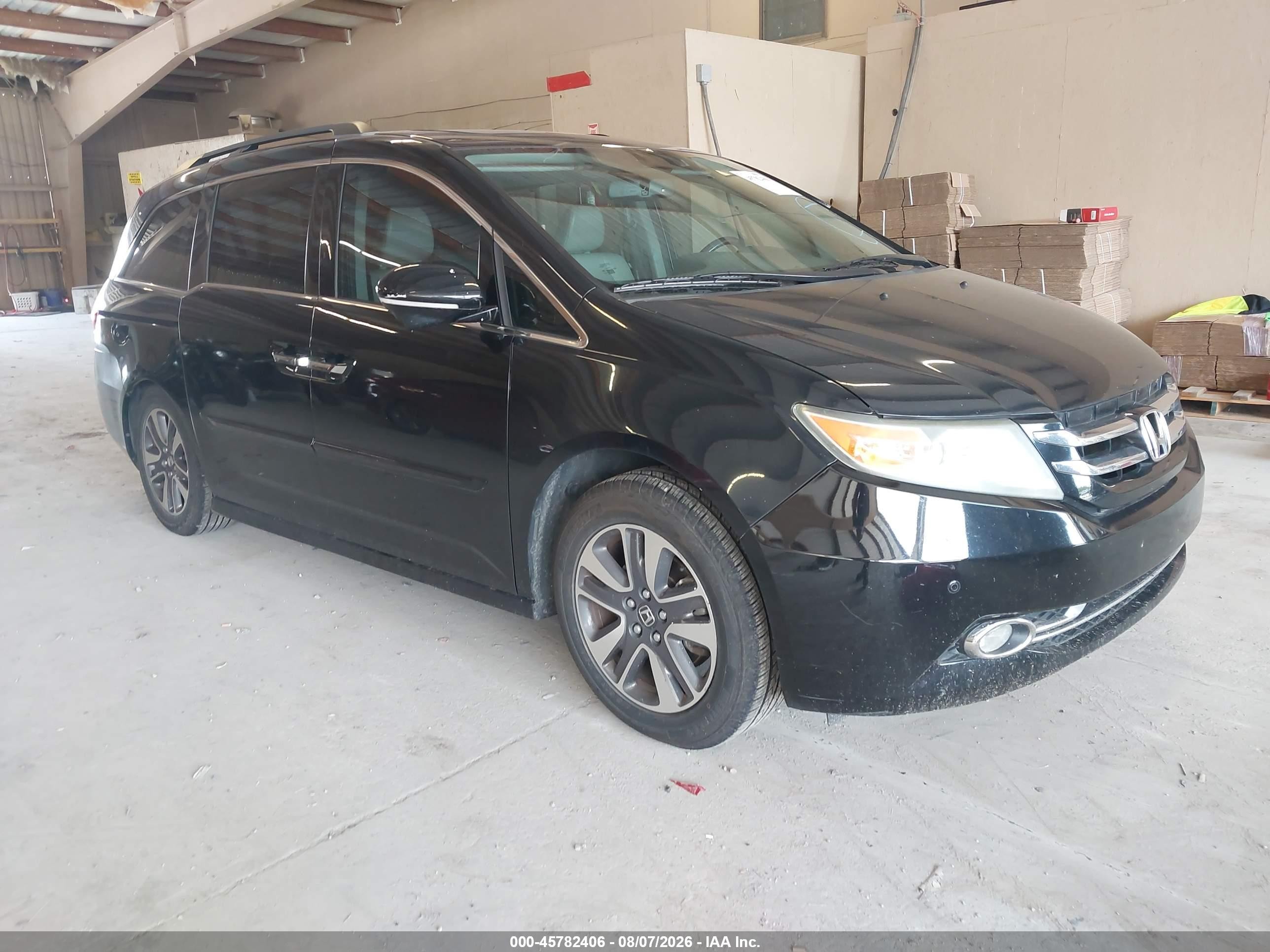 2014 Honda Odyssey Touring, VIN 5FNRL5H98EB002151 — Side