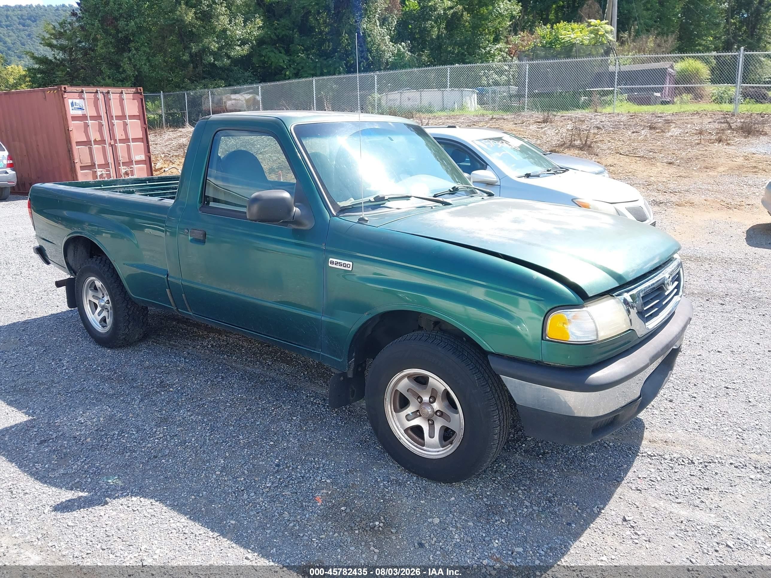 1999 Mazda B-Series SX, VIN 4F4YR12C3XTM40722 — Normal wear