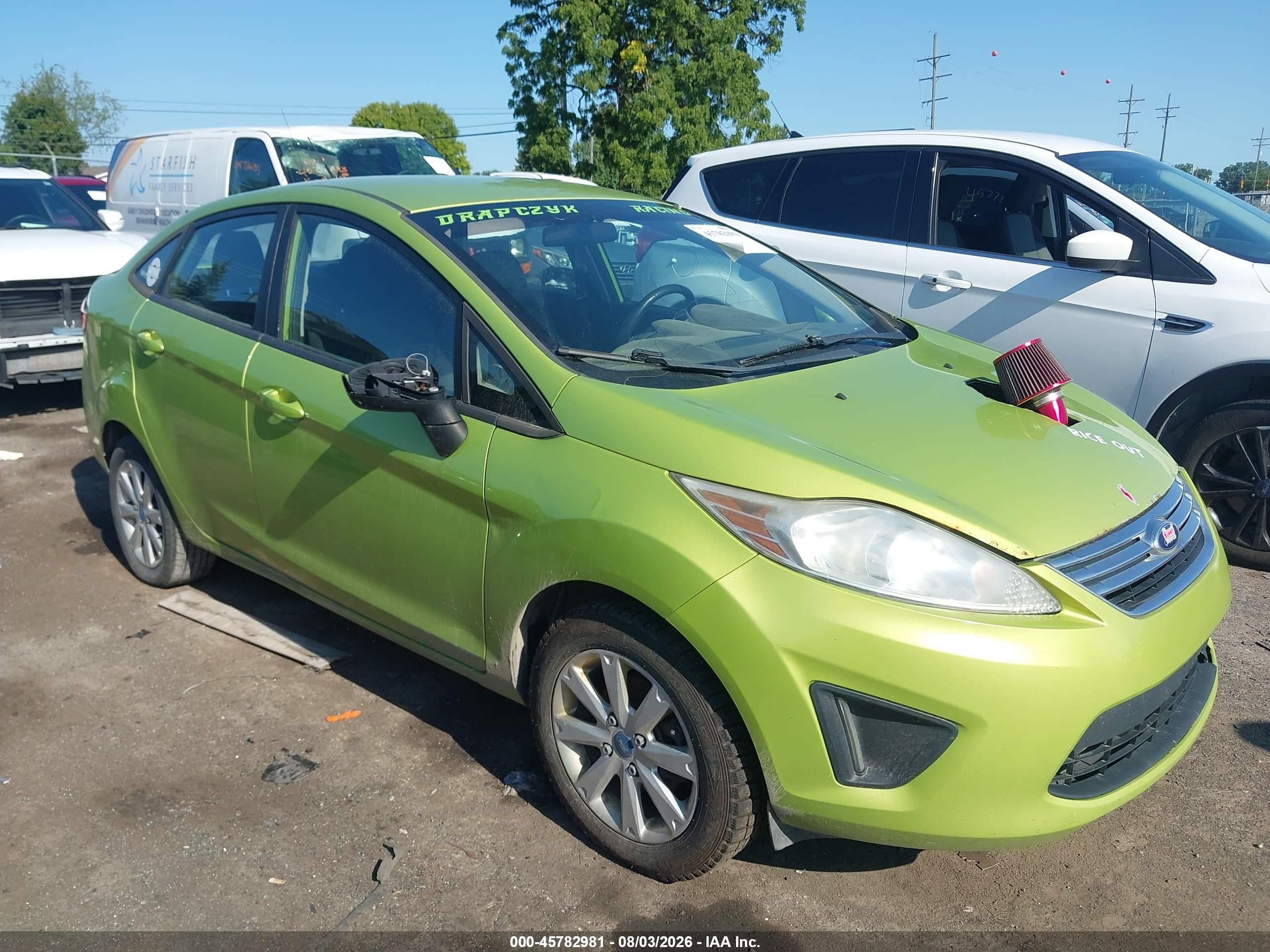 2013 Ford Fiesta SE, VIN 3FADP4BJ9DM158694 — Normal wear