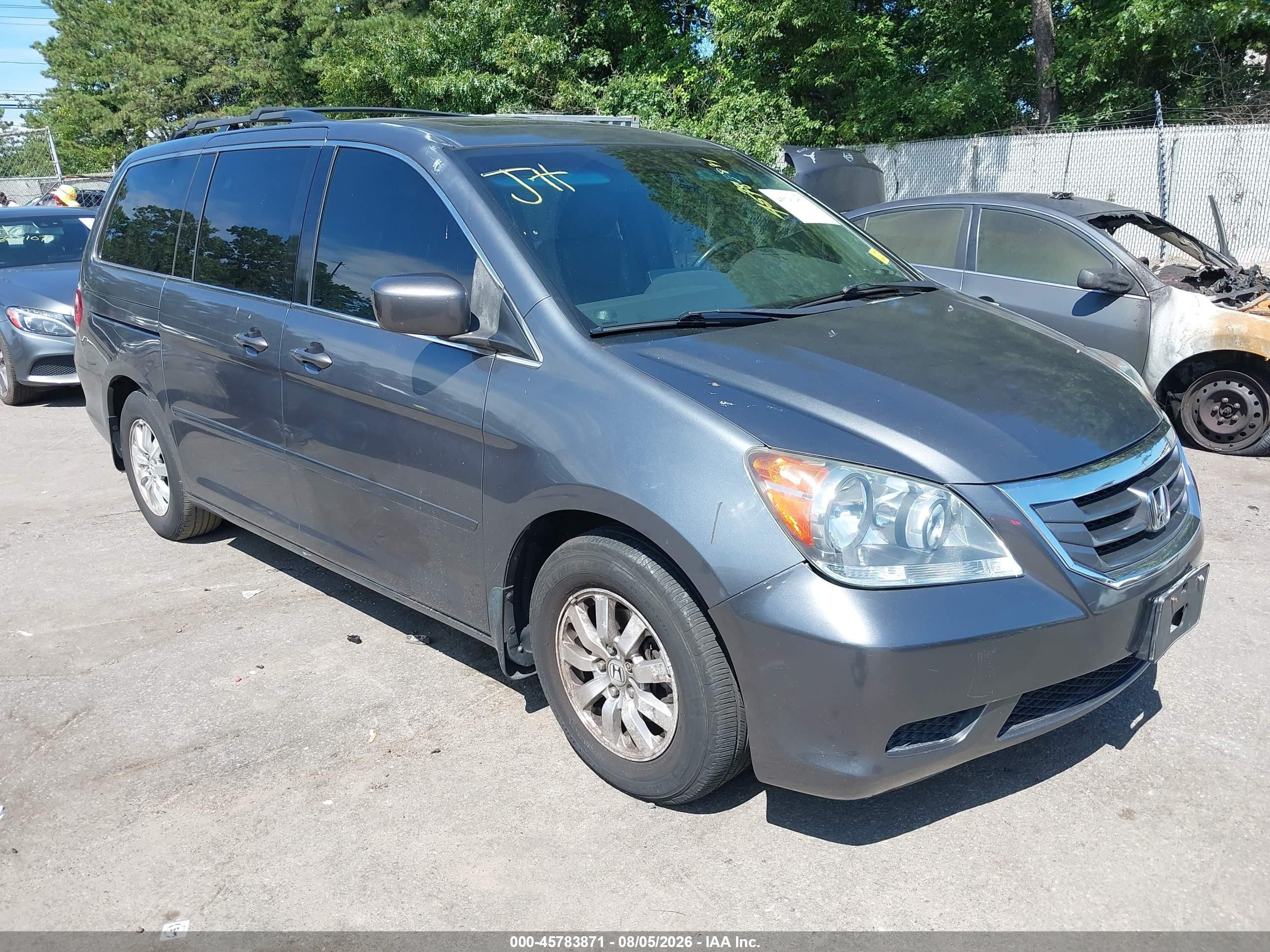 2010 Honda Odyssey EX-L, VIN 5FNRL3H73AB085176 — Side