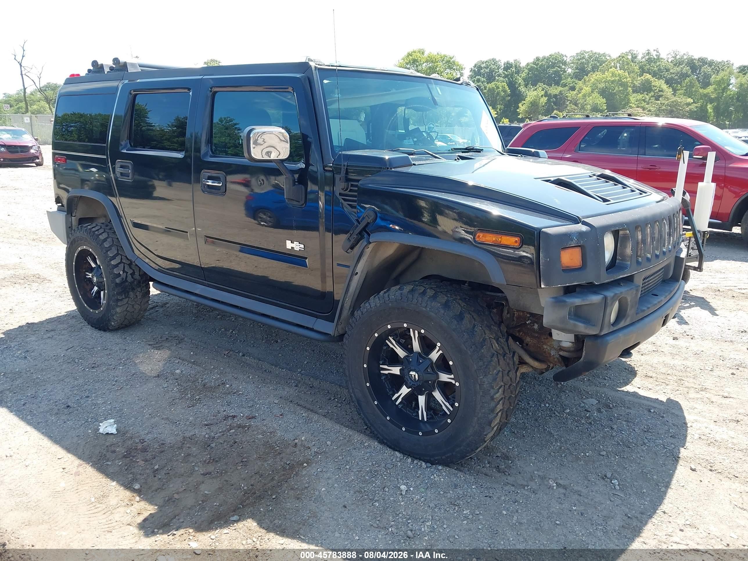 2005 Hummer H2 SUV, VIN 5GRGN23U05H129003 — Normal wear