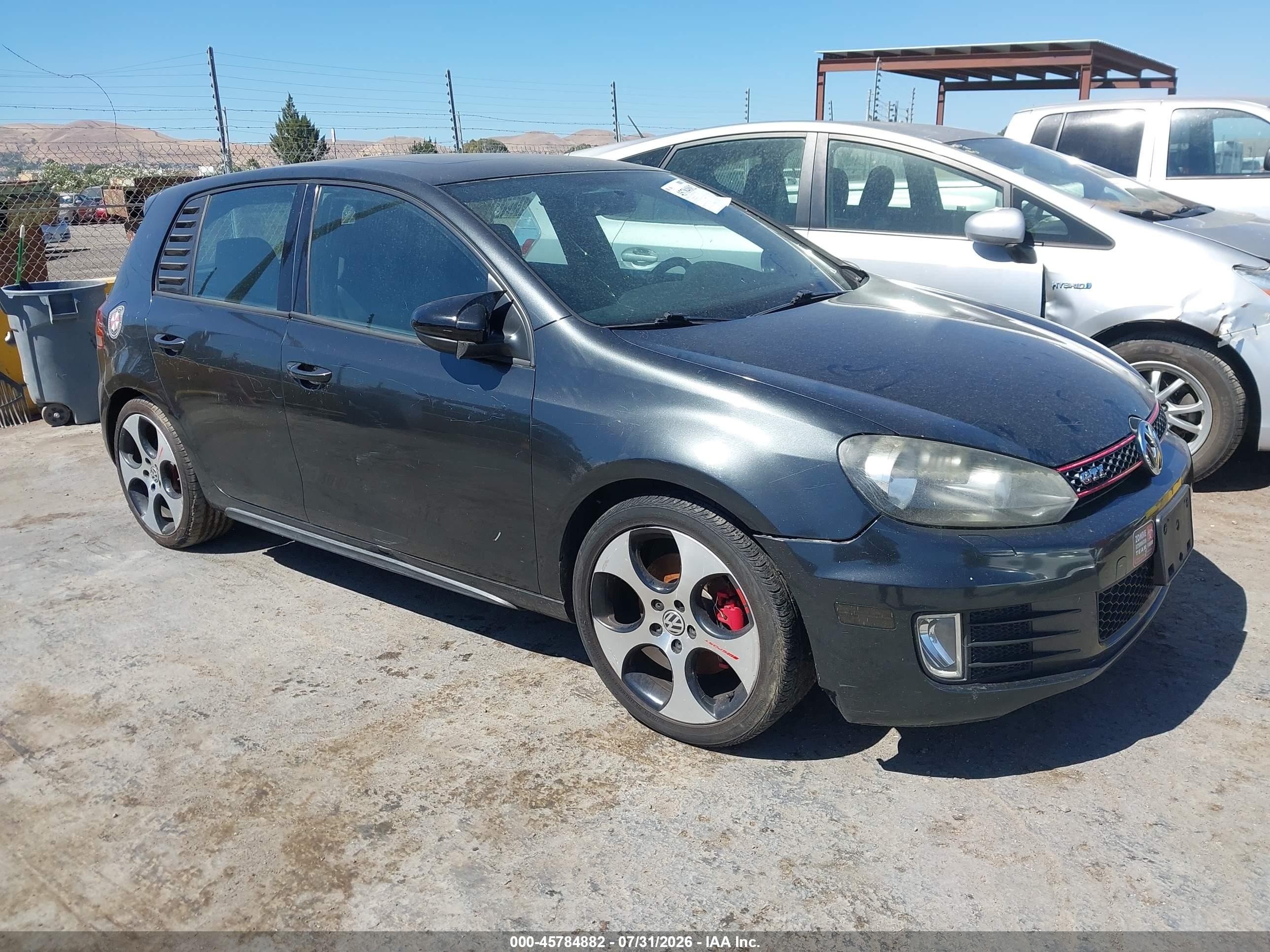 2012 Volkswagen Golf GTI PZEV, VIN WVWHD7AJ3CW015892 — Normal wear