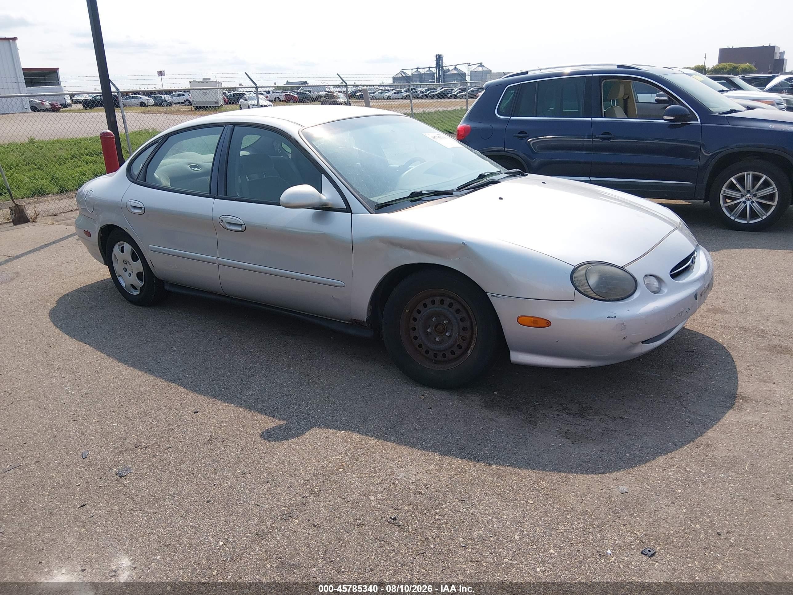 1999 Ford Taurus SE, VIN 1FAFP53U0XG298087 — Undercarriage