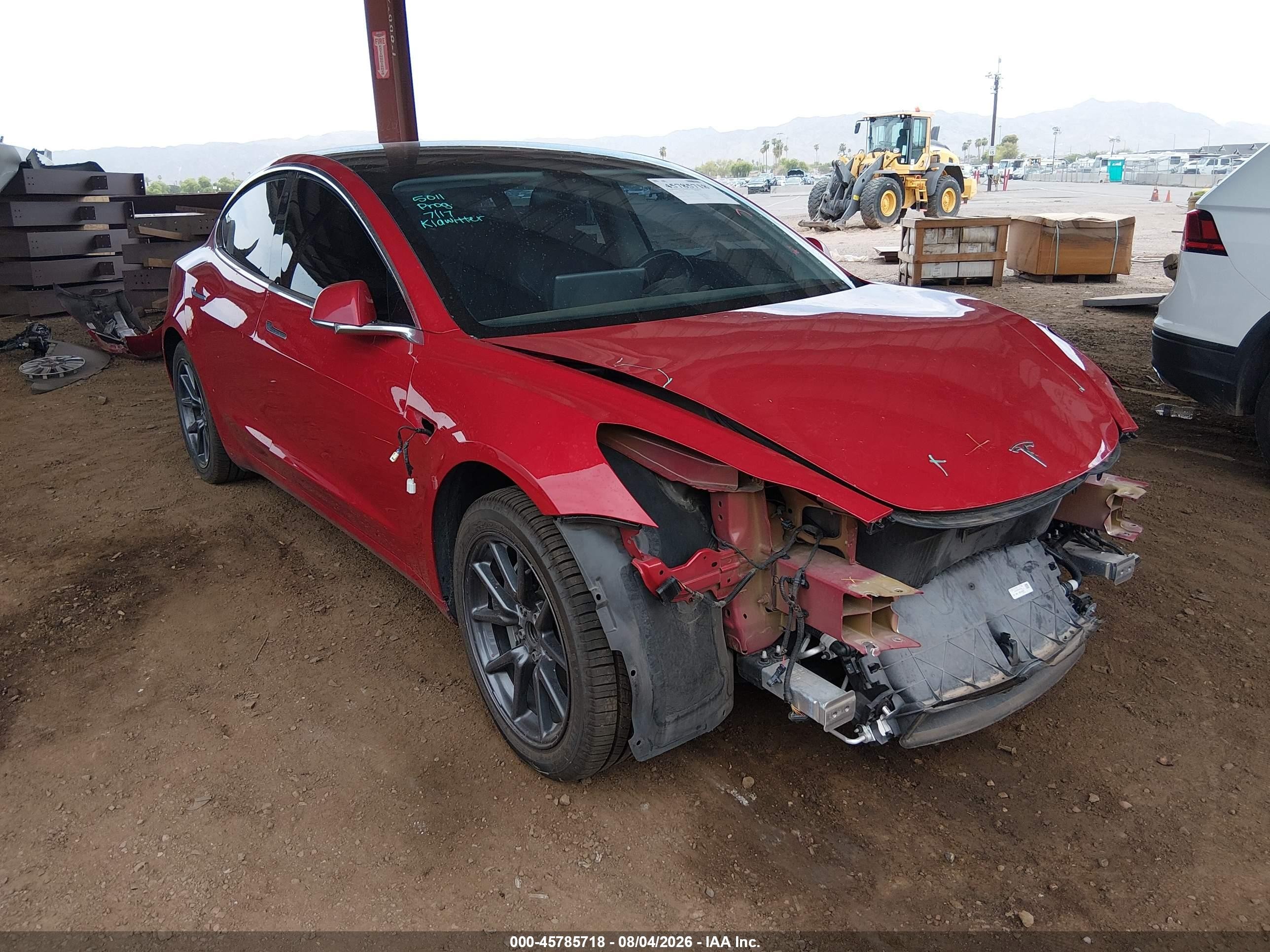 2019 Tesla Model 3 Mid Range, VIN 5YJ3E1EA2KF324822 — Перед