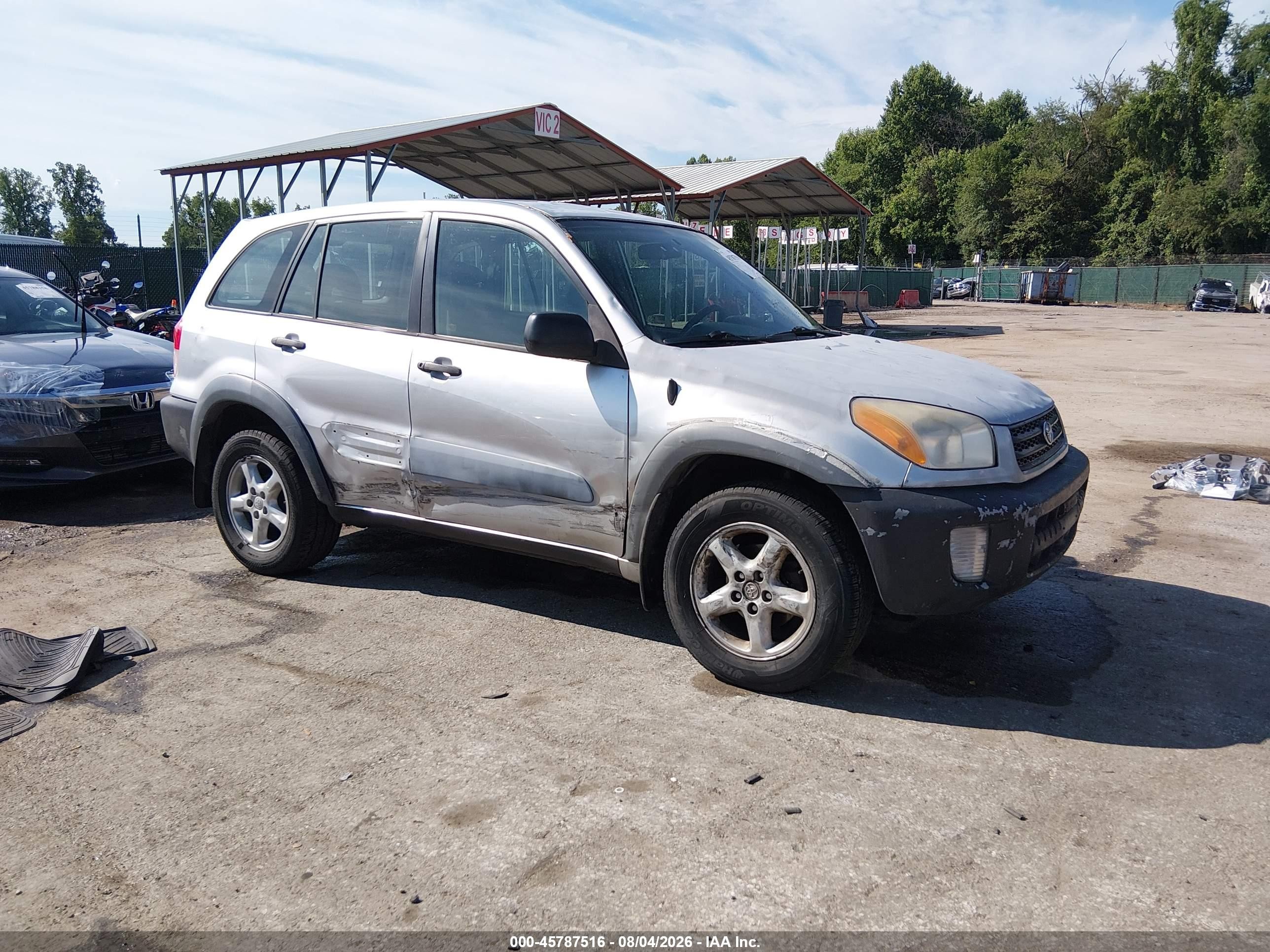 2001 Toyota RAV4, VIN JTEHH20V410046320 — Бок