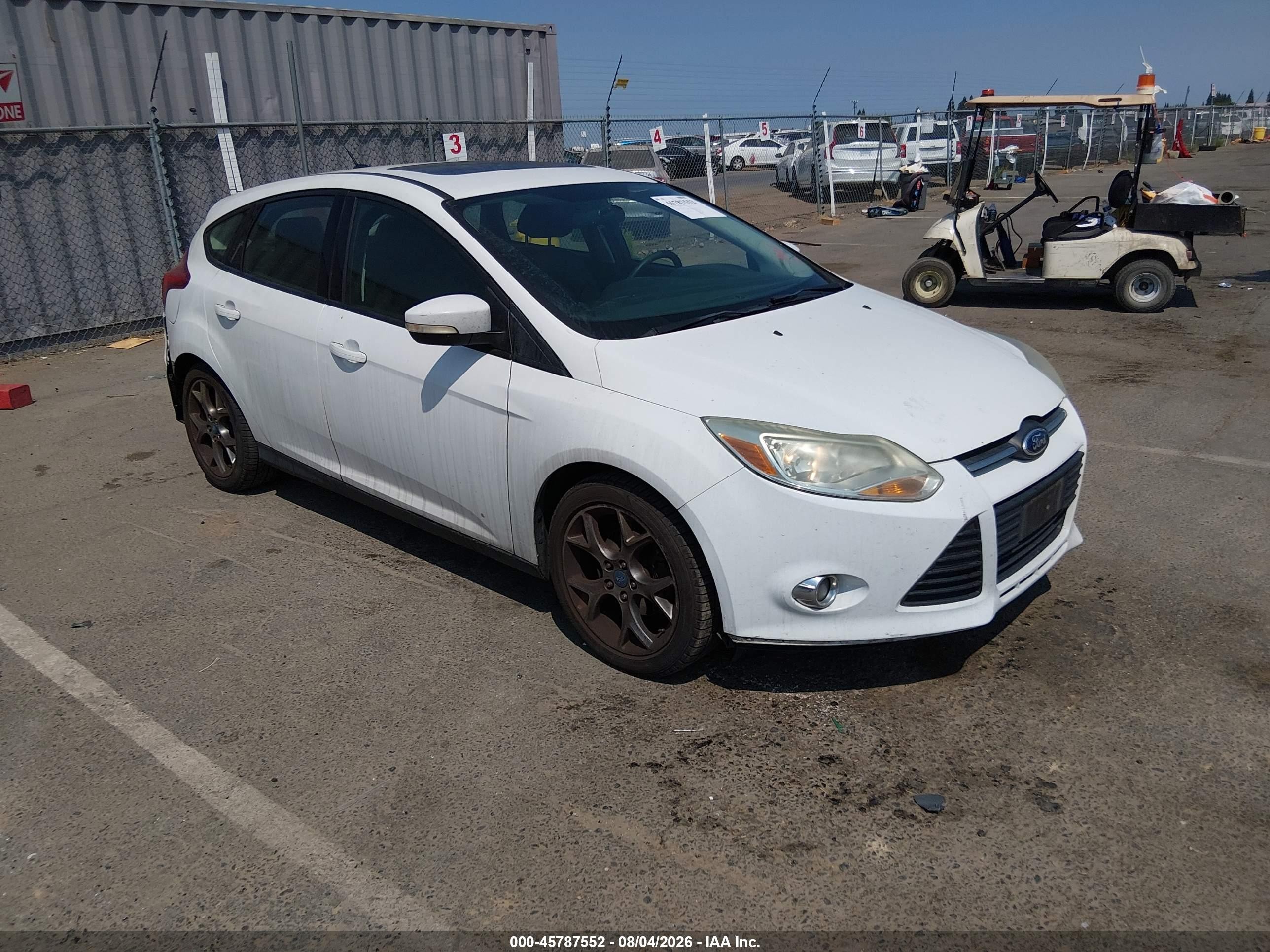 2013 Ford Focus SE, VIN 1FADP3K27DL273251 — Зад