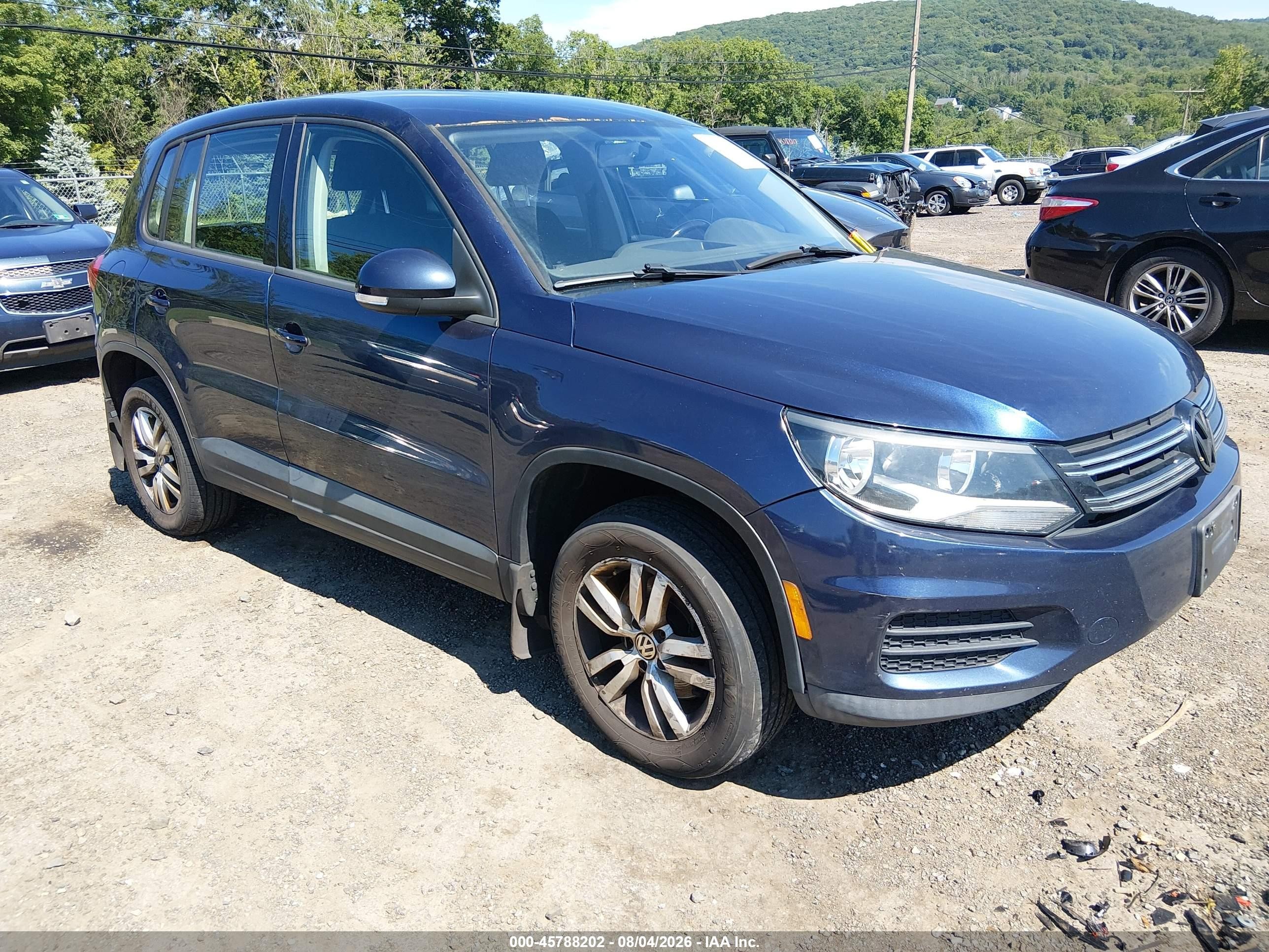 2014 Volkswagen Tiguan S, VIN WVGBV3AXXEW592370 — Обычный износ