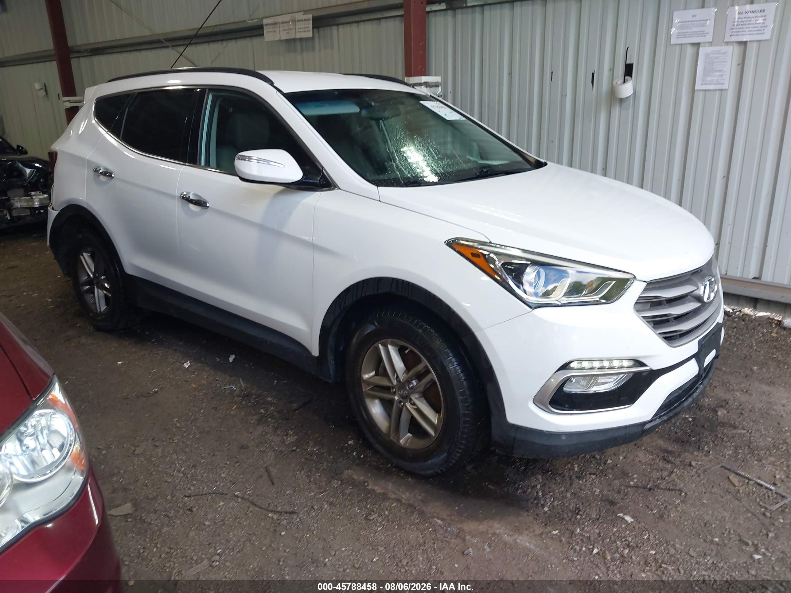 2017 Hyundai Santa Fe 2.4L, VIN 5NMZUDLB4HH049200 — Rear end