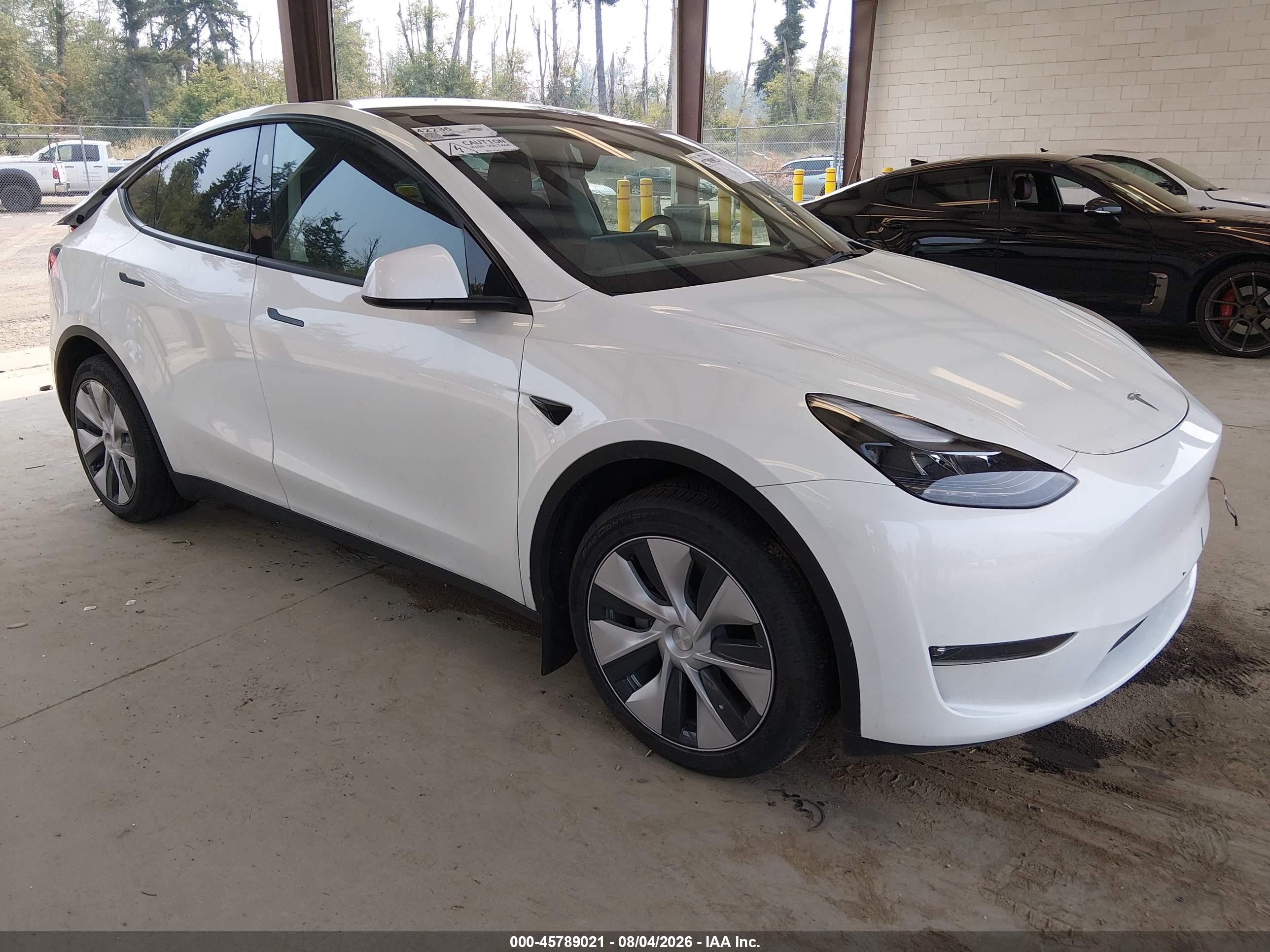 2023 Tesla Model Y Long Range, VIN 7SAYGDEE8PF886805 — Rear end