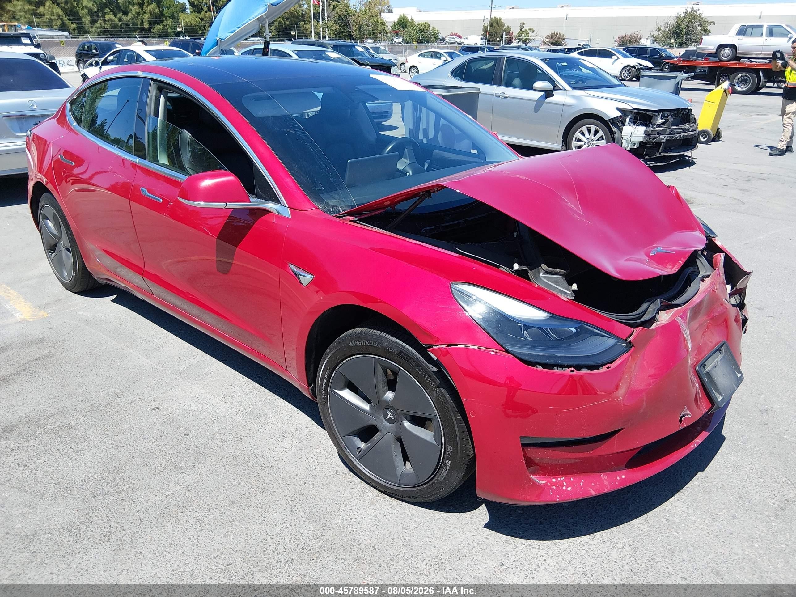 2019 Tesla Model 3 Mid Range, VIN 5YJ3E1EA9KF299076 — Front end