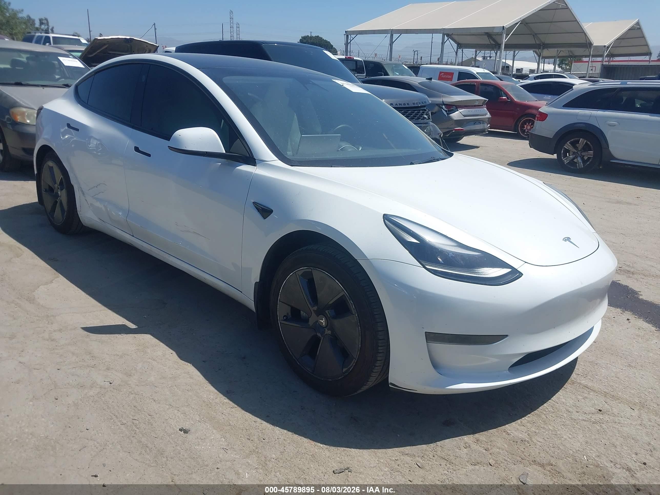 2023 Tesla Model 3, VIN 5YJ3E1EA3PF517570 — Normal wear