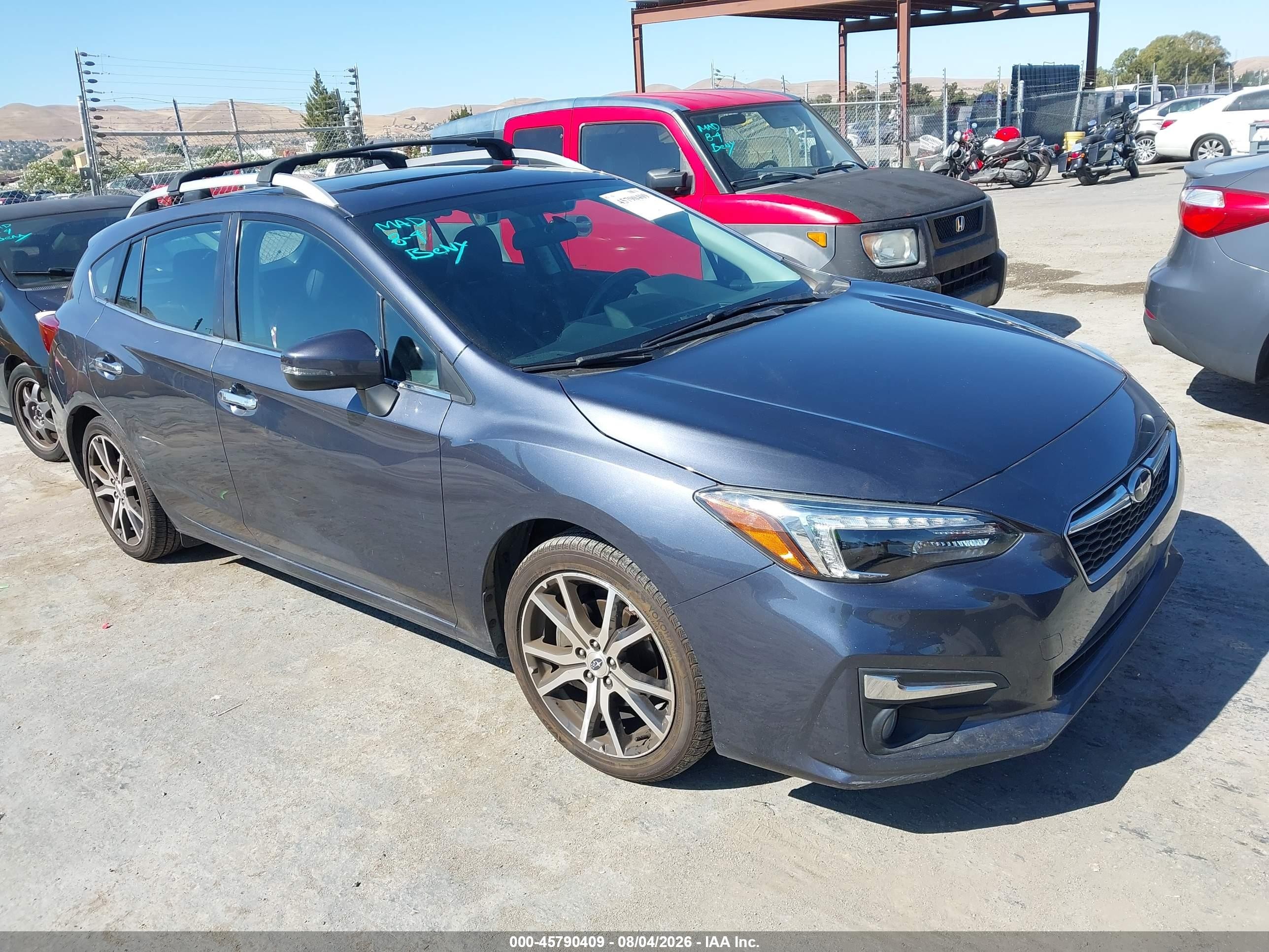 2017 Subaru Impreza Limited, VIN 4S3GTAU65H3705204 — Normal wear
