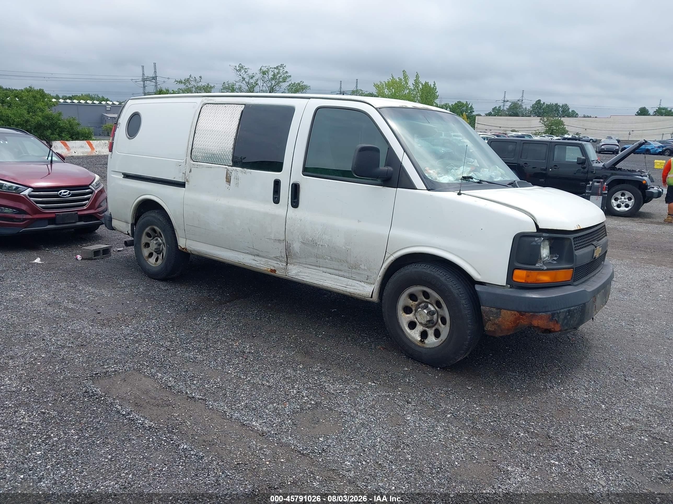 2012 Chevrolet Express Cargo, VIN 1GCSGAFX0C1120734 — Normal wear