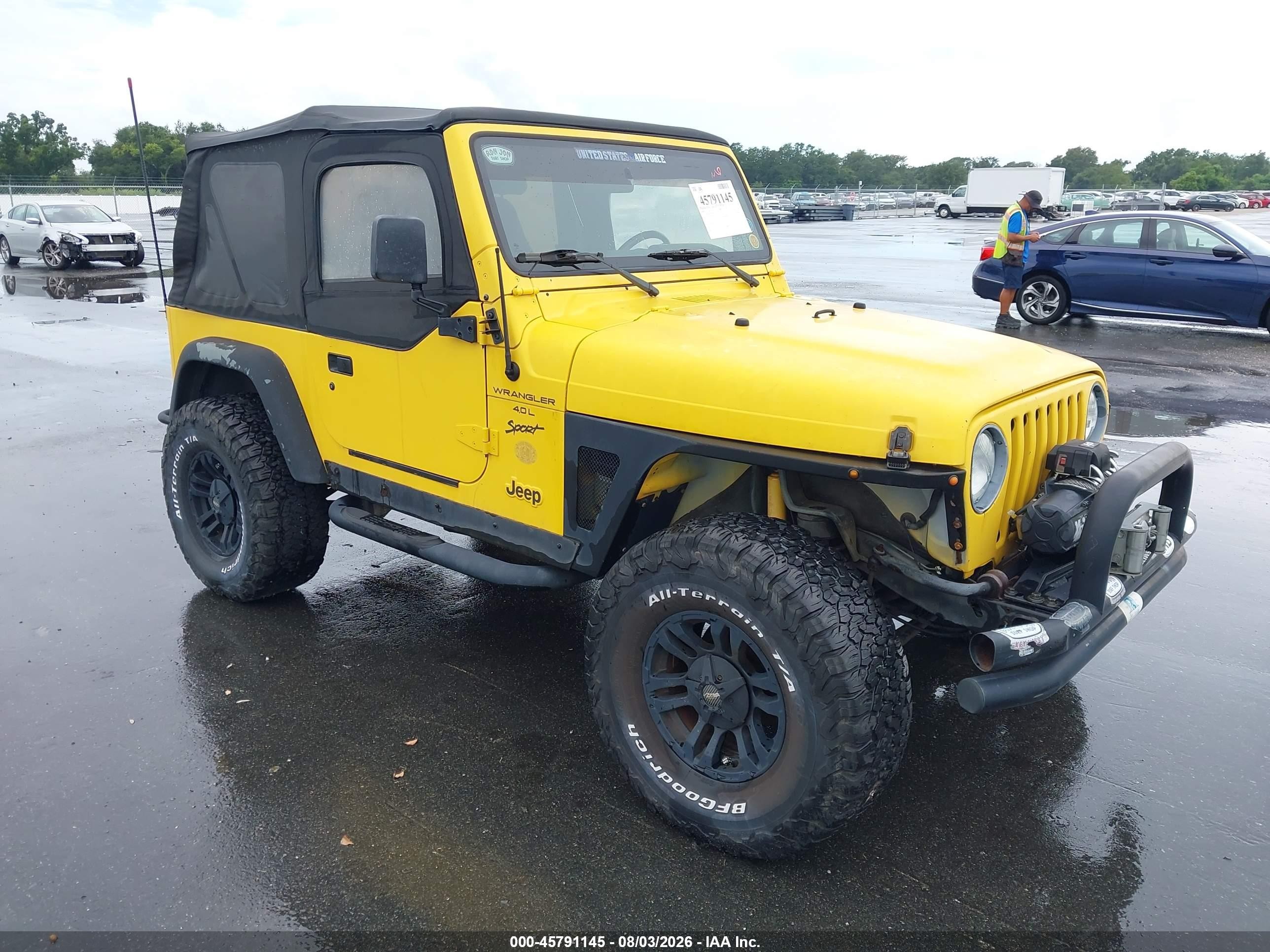 2000 Jeep Wrangler Sport, VIN 1J4FA49S3YP763954 — Normal wear