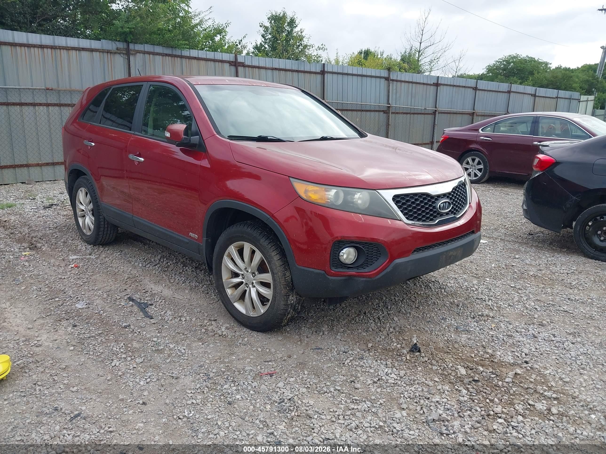 2011 Kia Sorento EX, VIN 5XYKUCA13BG012128 — Normal wear