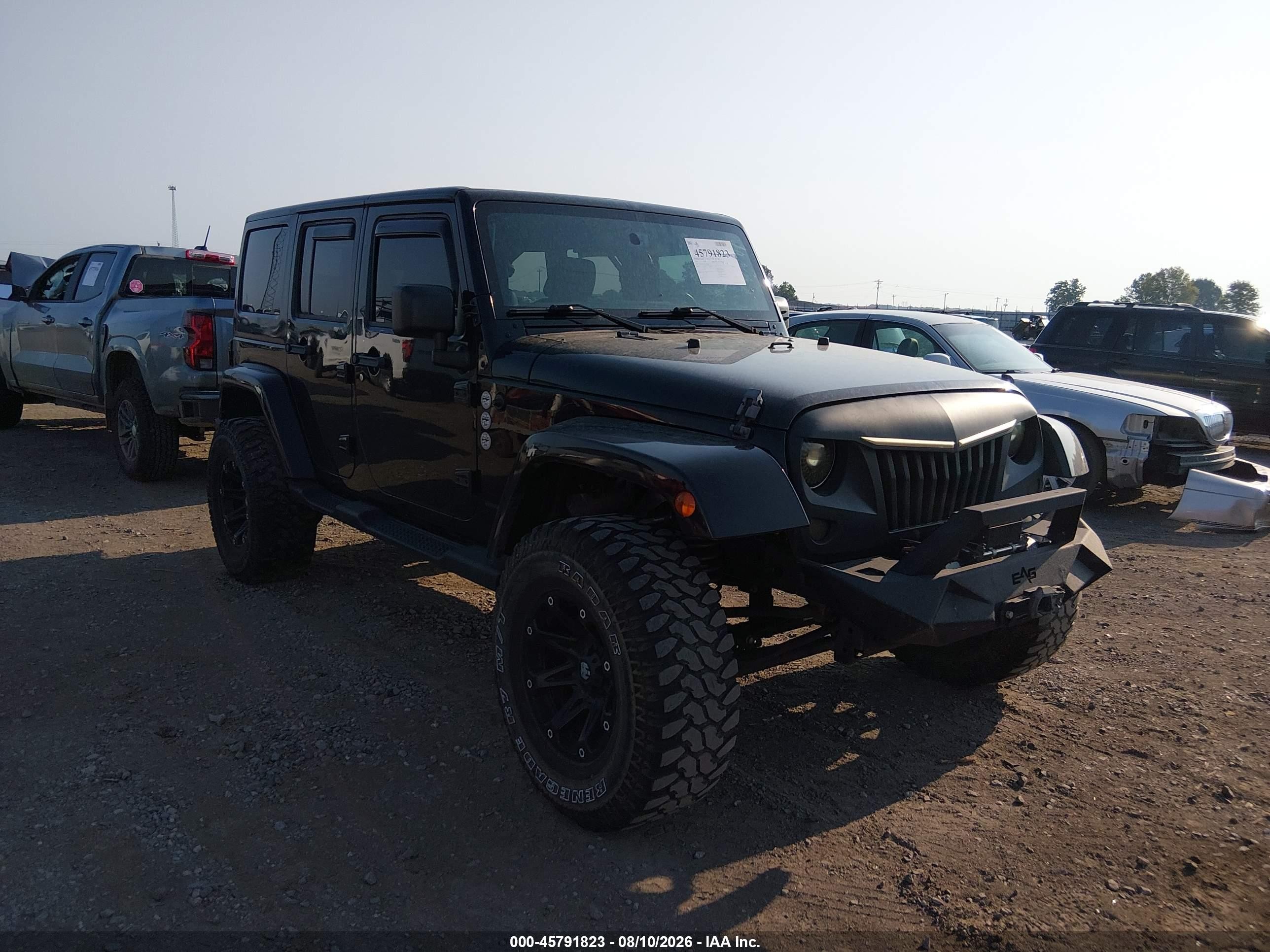 2014 Jeep Wrangler Unlimited Sahara, VIN 1C4BJWEG5EL185506 — Normal wear