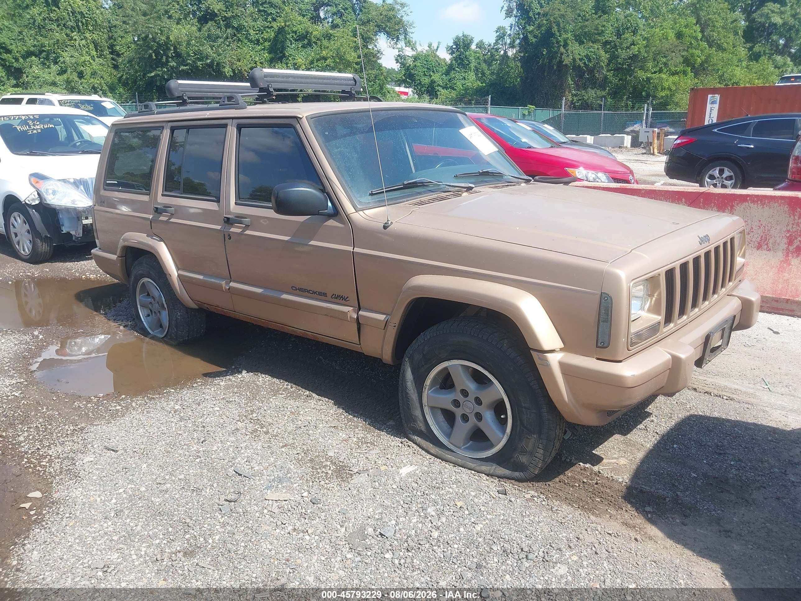 1999 Jeep Cherokee Sport, VIN 1J4FF68S5XL518027 — Normal wear