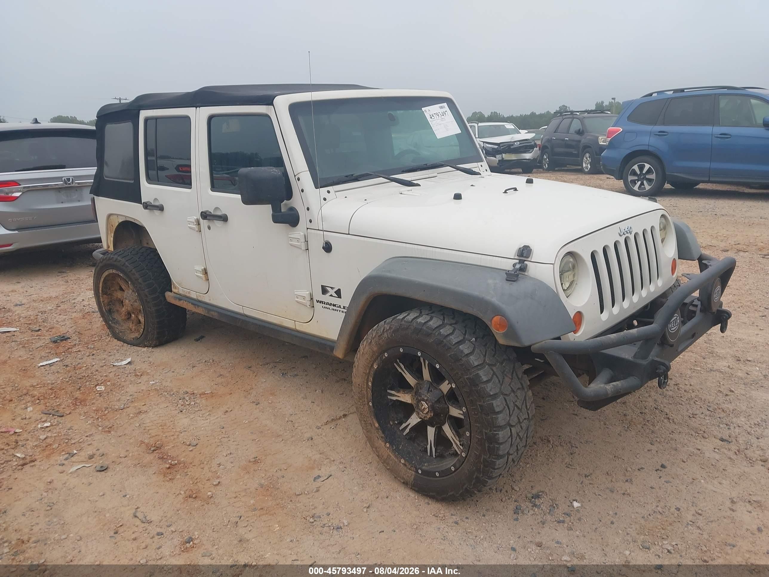 2007 Jeep Wrangler Unlimited X, VIN 1J4GB39157L226589 — Side