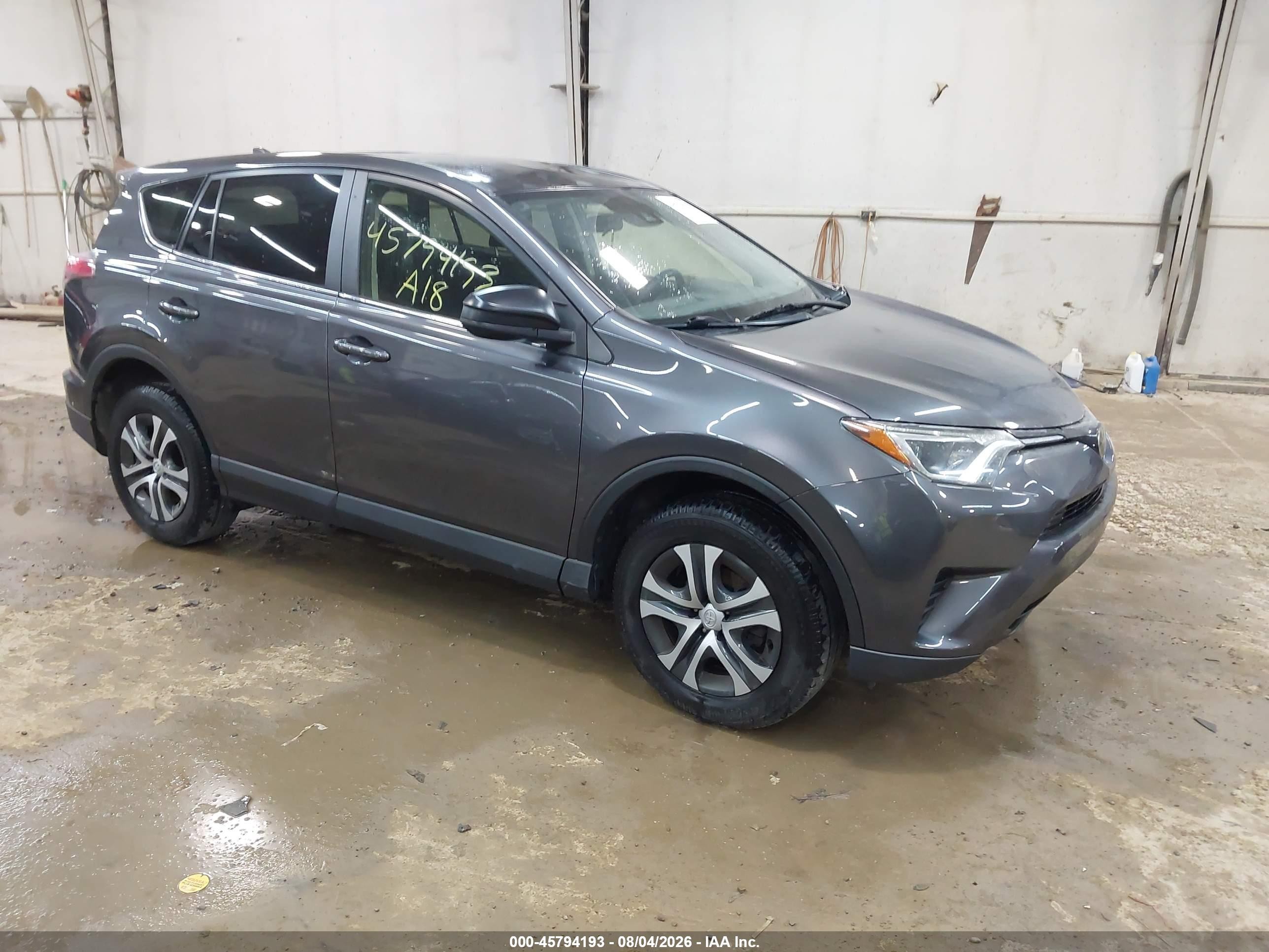 2018 Toyota RAV4 LE, VIN JTMBFREV5JJ732569 — Hail