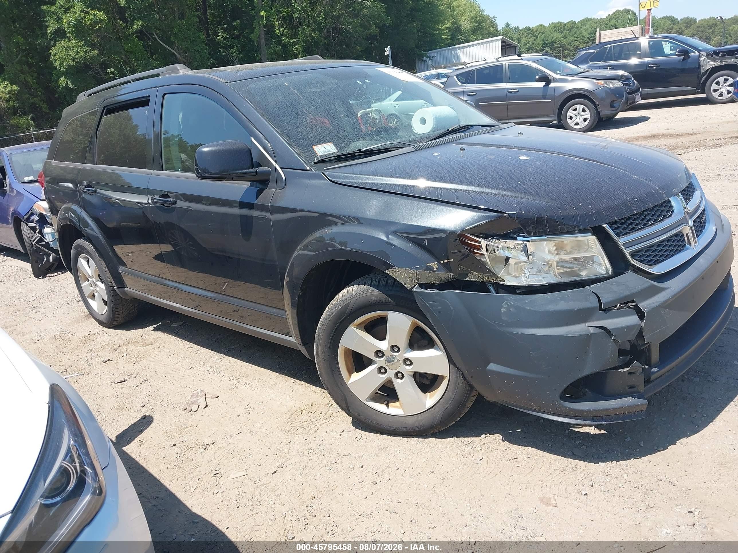 2011 Dodge Journey Mainstreet, VIN 3D4PH1FG9BT512317 — Front end