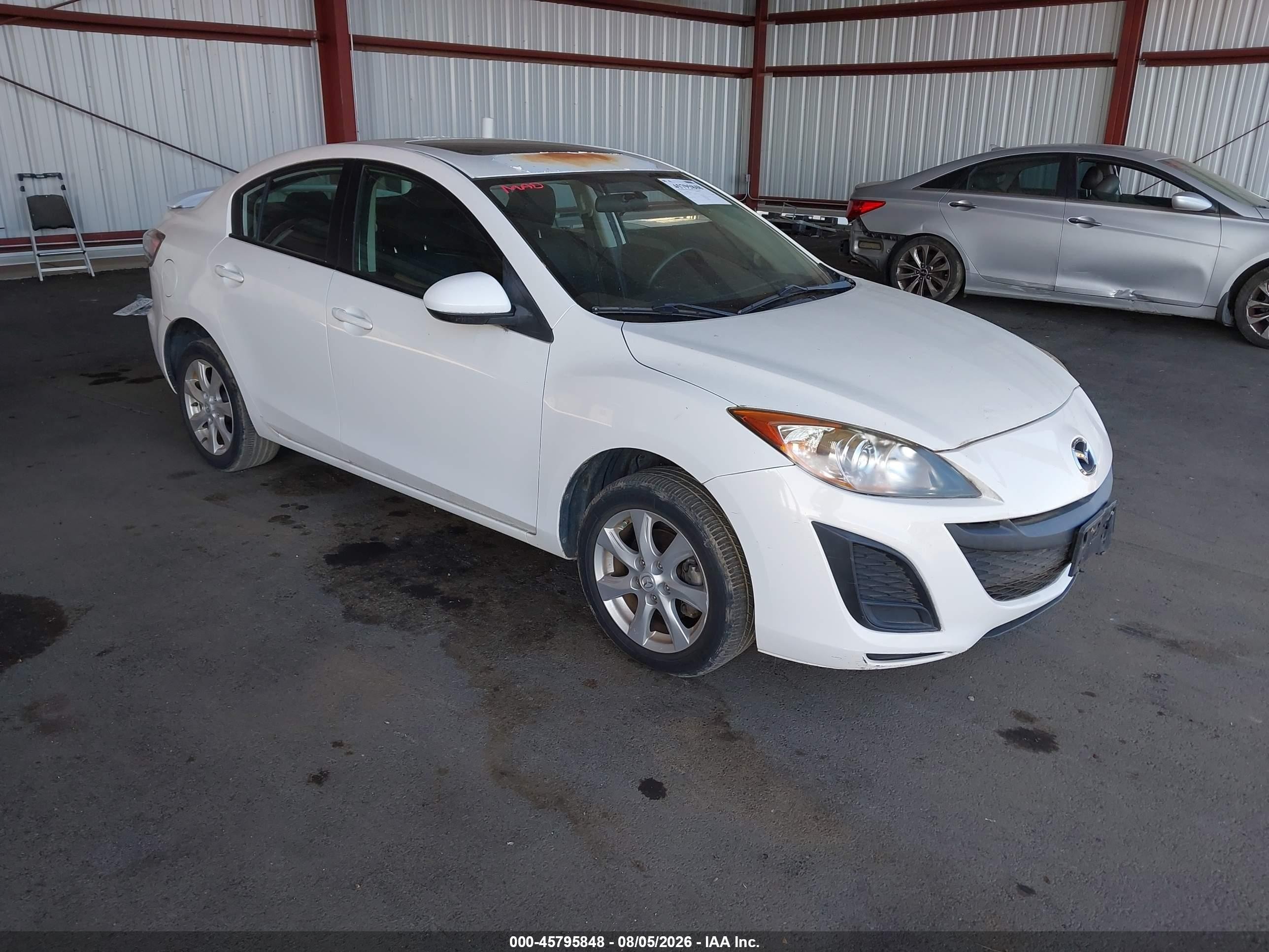 2011 Mazda 3 i Touring, VIN JM1BL1VF7B1475502 — Normal wear