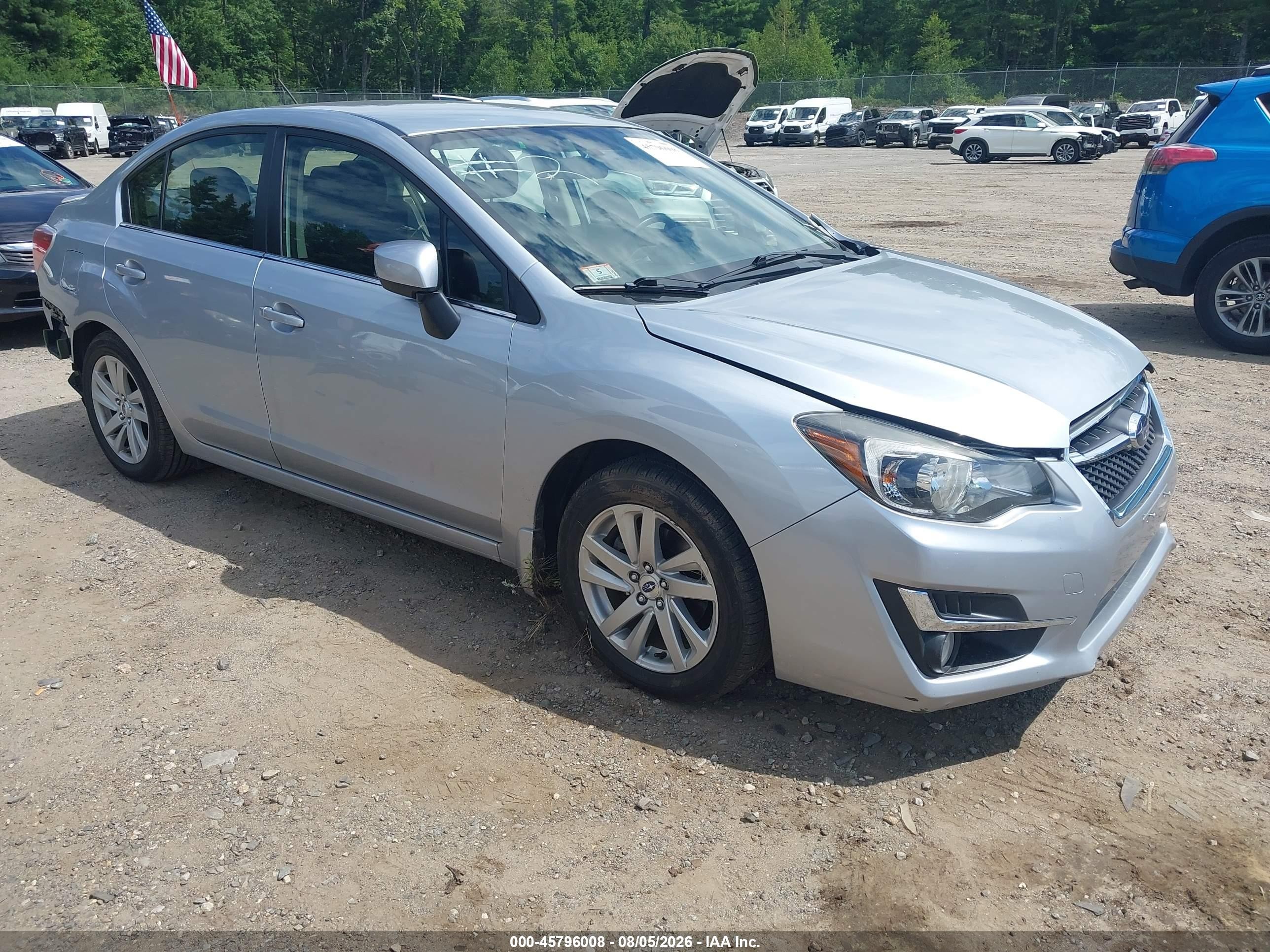 2016 Subaru Impreza Premium, VIN JF1GJAB66GH019608 — Бок