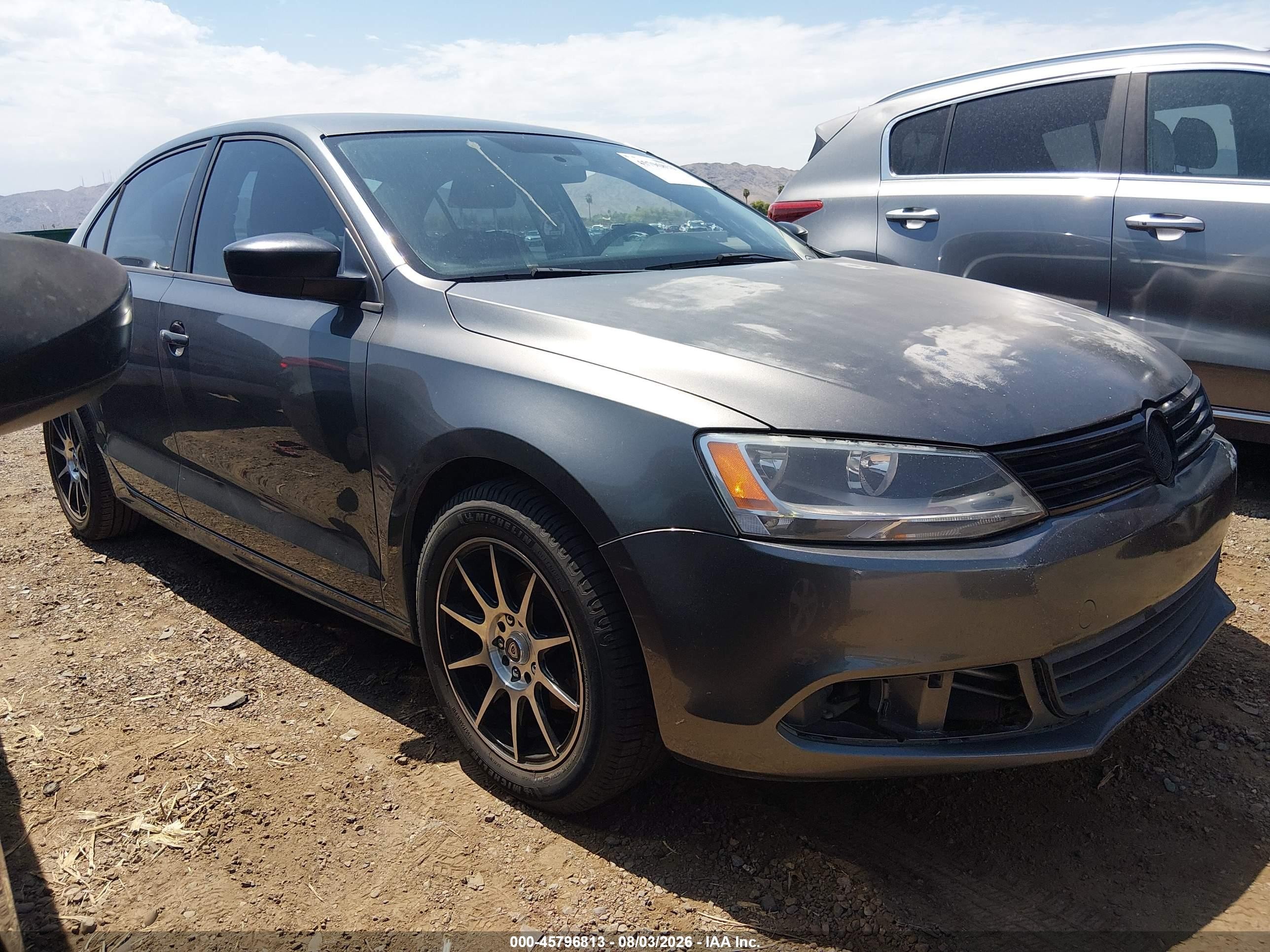 2014 Volkswagen Jetta S, VIN 3VW2K7AJ4EM299514 — Normal wear