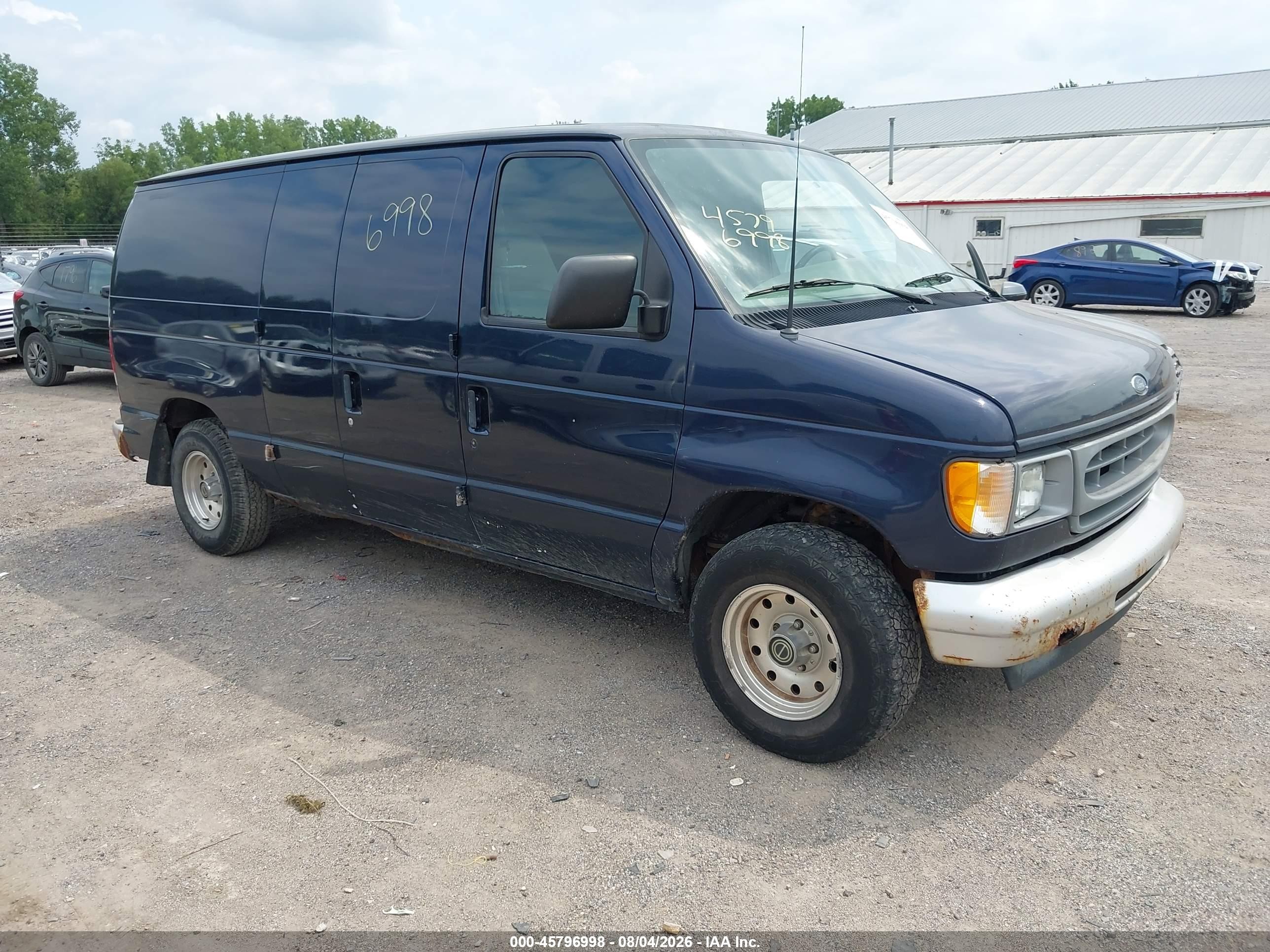 2001 Ford Econoline Cargo, VIN 1FTRE14261HB28773 — Обычный износ