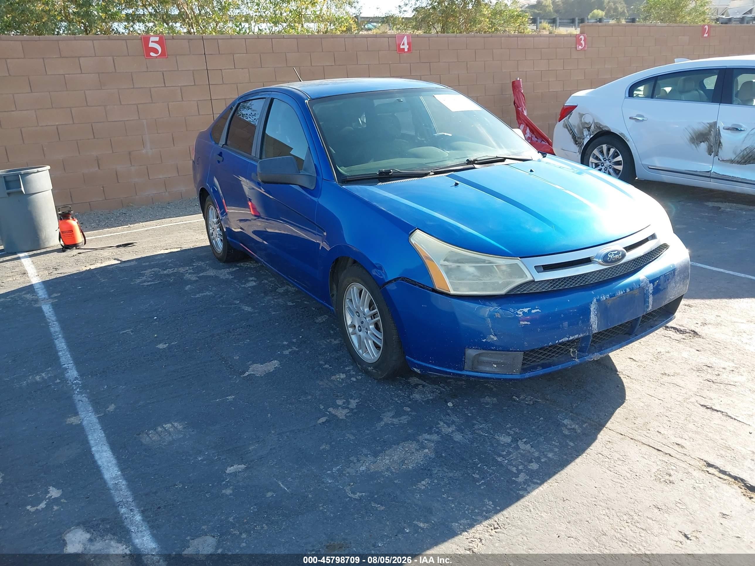 2010 Ford Focus SE, VIN 1FAHP3FN0AW121859 — Normal wear