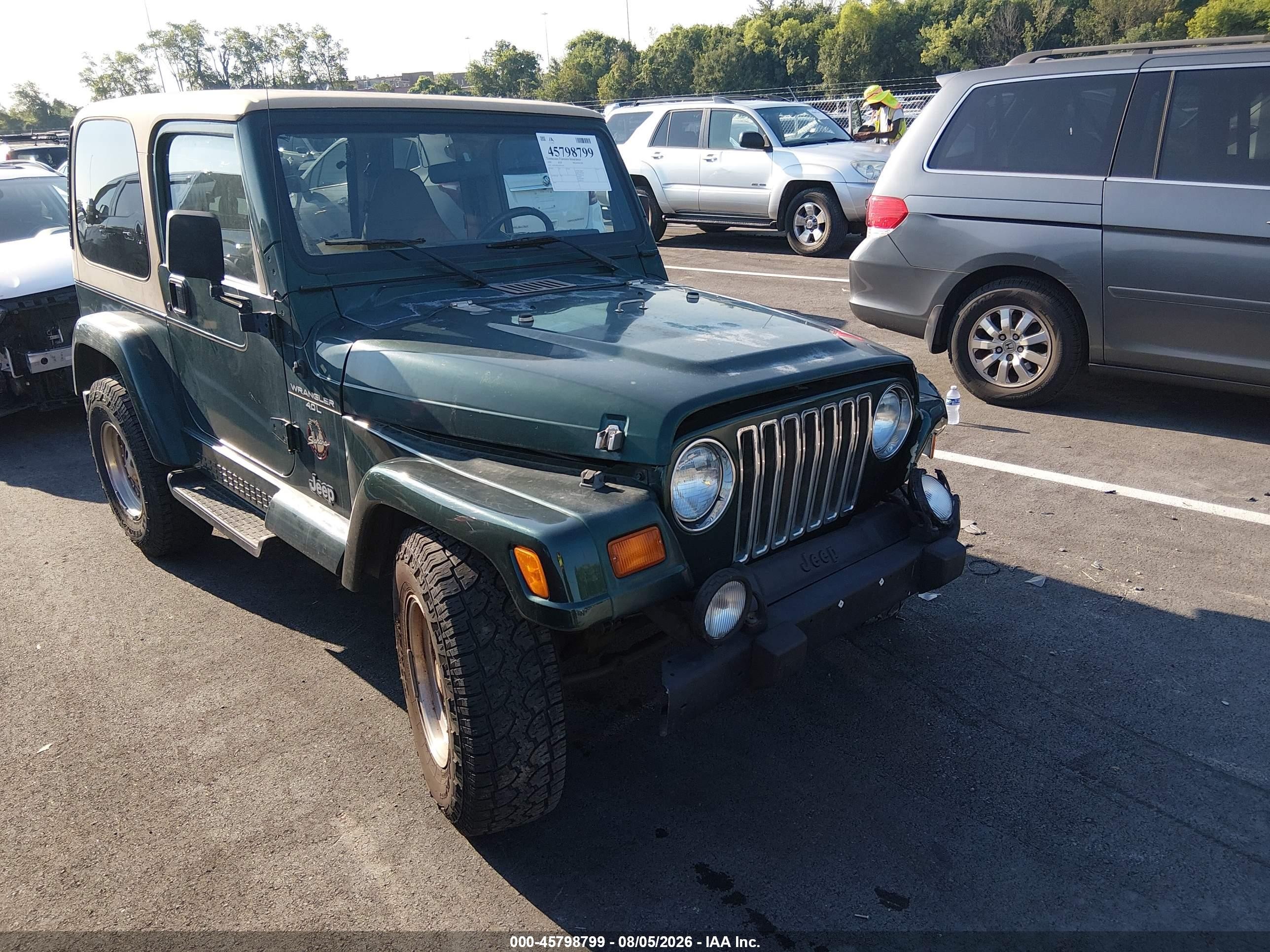 1999 Jeep Wrangler Sahara, VIN 1J4FY49S7XP431347 — Front end