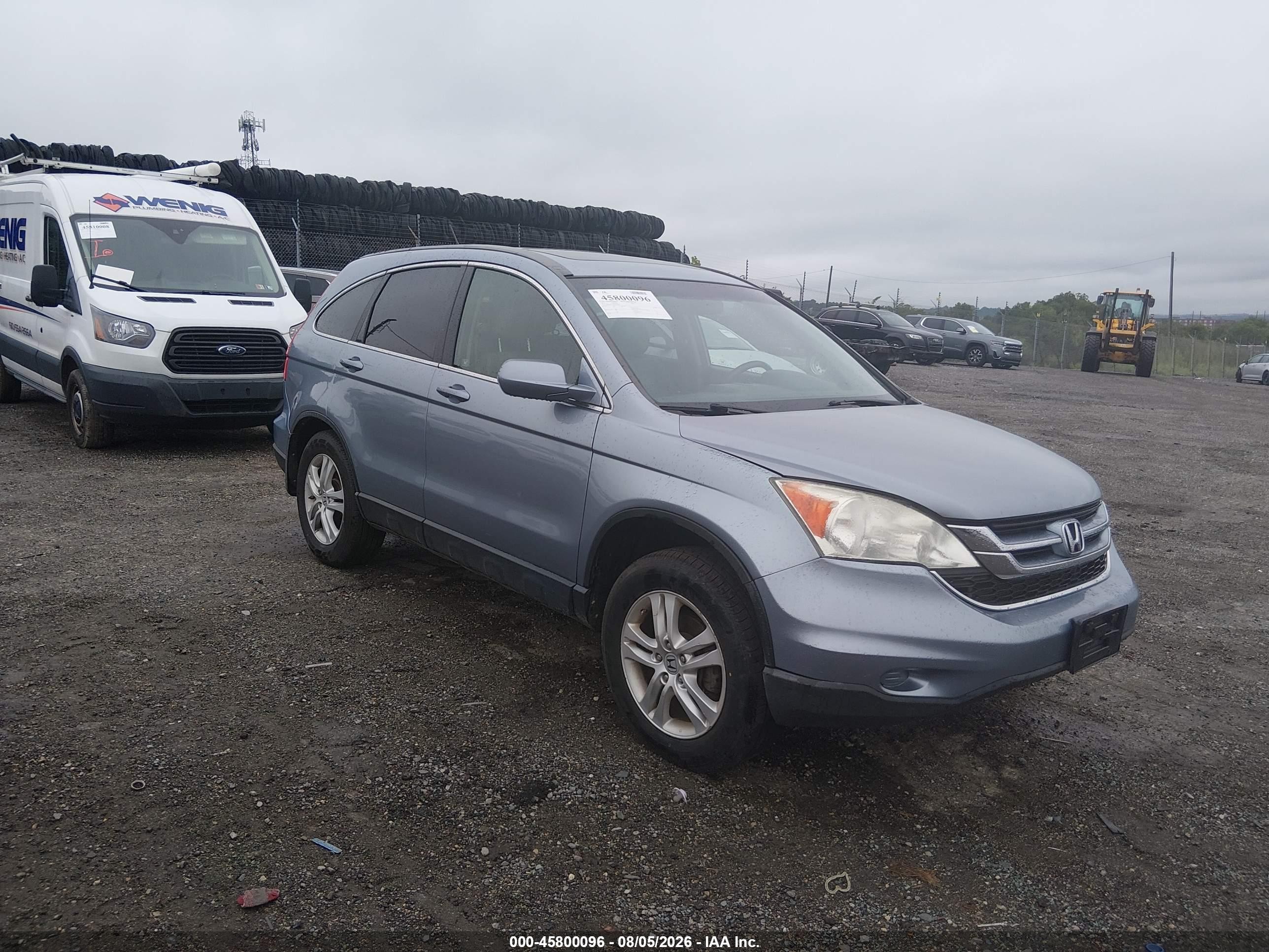 2011 Honda CR-V EX-L, VIN JHLRE4H74BC021682 — Бок