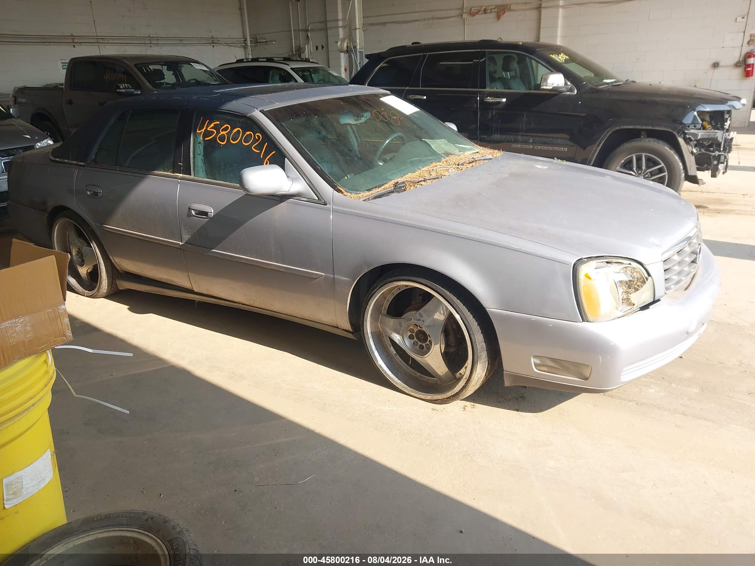 2004 Cadillac DeVille, VIN 1G6KD54Y44U226635 — Normal wear